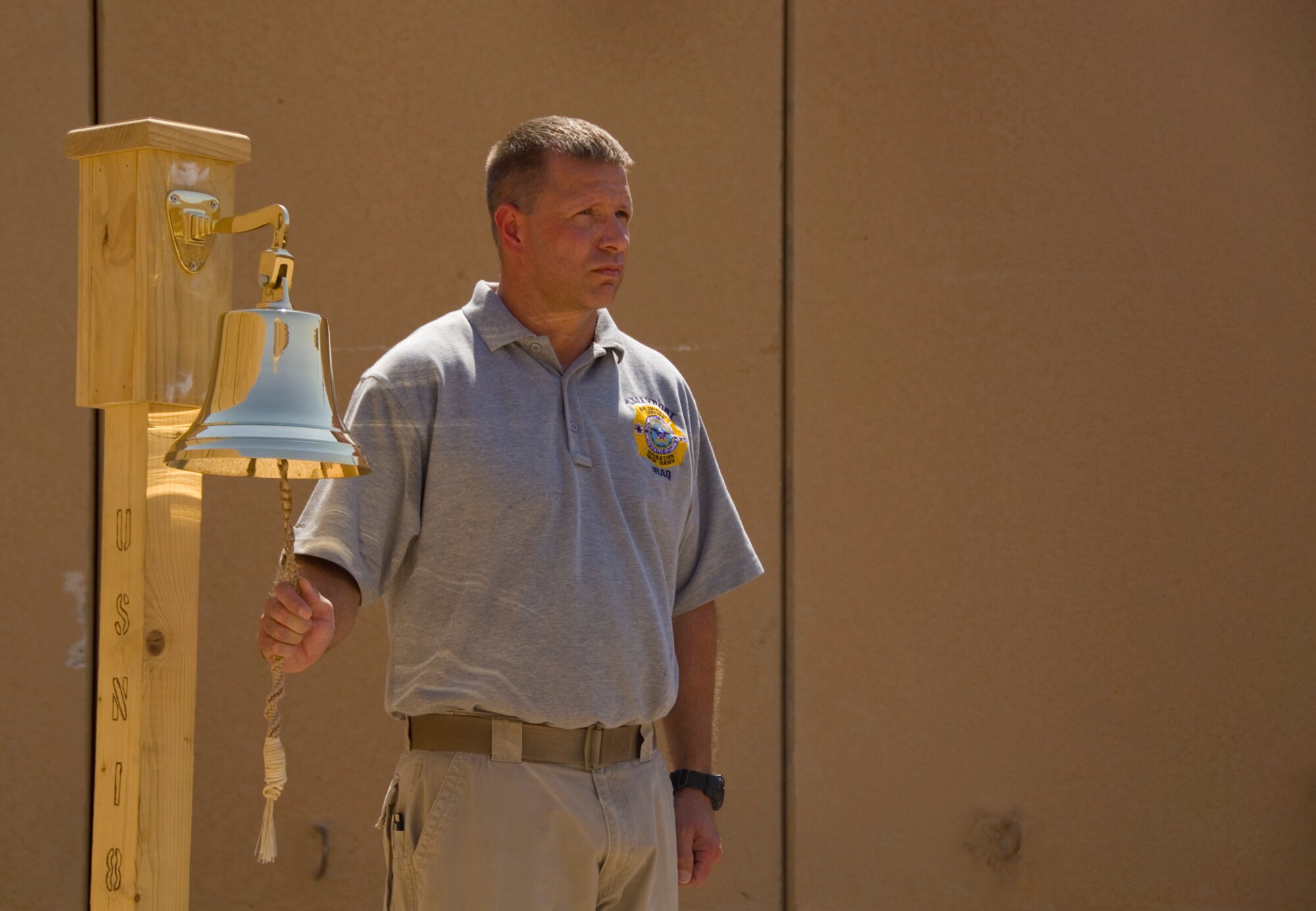 William Ruder, a fire inspector, participates in the 9/11 Remembrance Ceremony on Al Asad Air Base, Iraq Sept. 11, 2011. The ceremony remembers the terrorists attacks on Sept. 11, 2001. (U.S. AIr Force photo/Staff Sgt. Shawn Rose)
