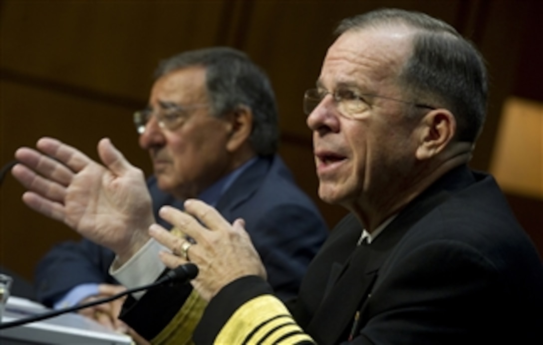 Chairman of the Joint Chiefs of Staff Adm. Mike Mullen, U.S. Navy, testifies alongside Secretary of Defense Leon E. Panetta at a Senate Armed Services Committee hearing on the U.S. strategy in Afghanistan and Iraq on Sept. 22, 2011, in Washington, D.C.  