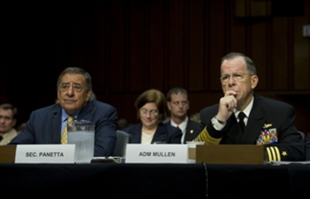 Secretary of Defense Leon E. Panetta and Chairman of the Joint Chiefs of Staff Adm. Mike Mullen listen to a senator’s question as they testify at a Senate Armed Services Committee hearing on the U.S. strategy in Afghanistan and Iraq on Sept. 22, 2011, in Washington, D.C.  