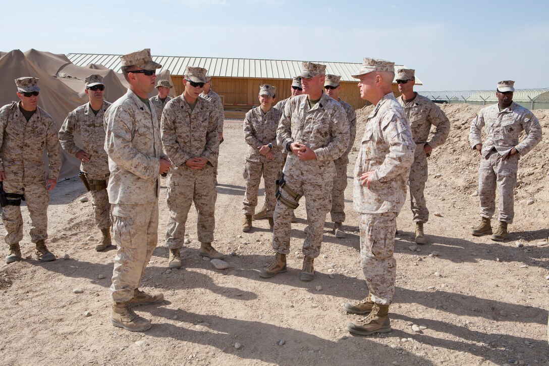 Col. Terry V. Williams, left, commanding officer, Marine Corps Logistics Base Albany, is among several military and public officials to cut the ribbon on the $20 million generator plant during a ceremony held here, Friday.