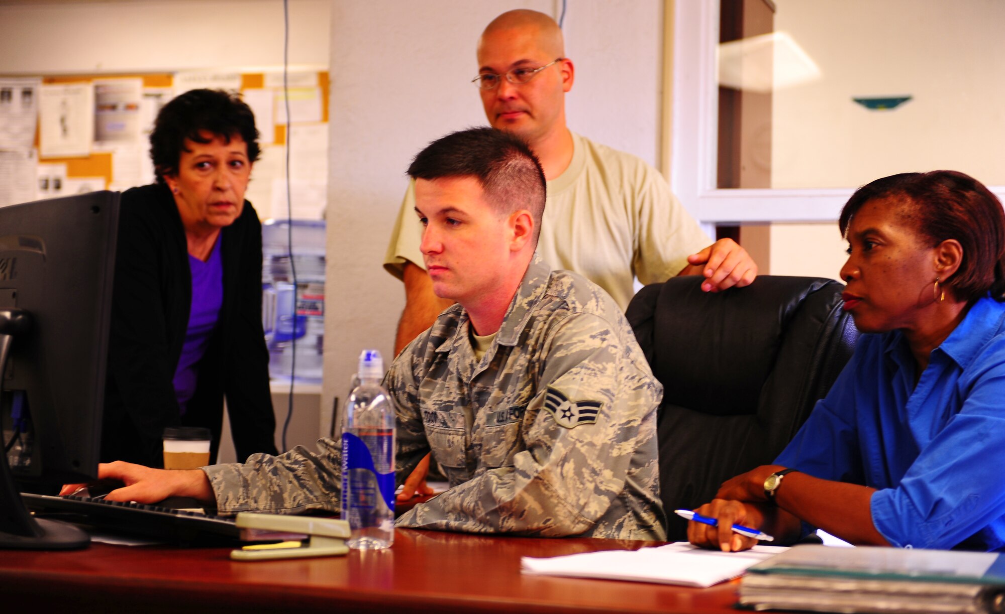 Several workers from the 7th Logistics Readiness Squadron’s Inbound Section negotiate a portion of their Defense Transportation Coordination Initiative training Sept. 22, 2011 at Dyess Air Force Base, Texas. The DTCI program is training used to manage continental U.S. distribution of various types of freight for 115 Department of Defense locations. (U.S. Air Force photo by Airman 1st Class Peter Thompson/Released)