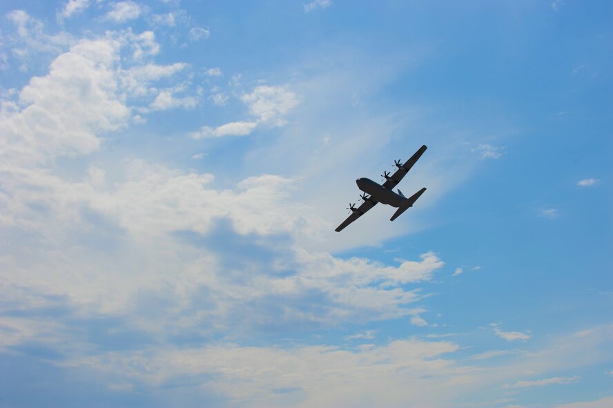 Brig. Gen. John Owen, Air Mobility Command, flies above the flightline Sept. 22, 2011 at Dyess Air Force Base, Texas. The aircraft is the seventh of 28 to be delivered to Dyess by 2013, replacing the current aging fleet of C-130 Hercules models. (U.S. Air Force photo by Airman 1st Class Jonathan Stefanko/ Released)