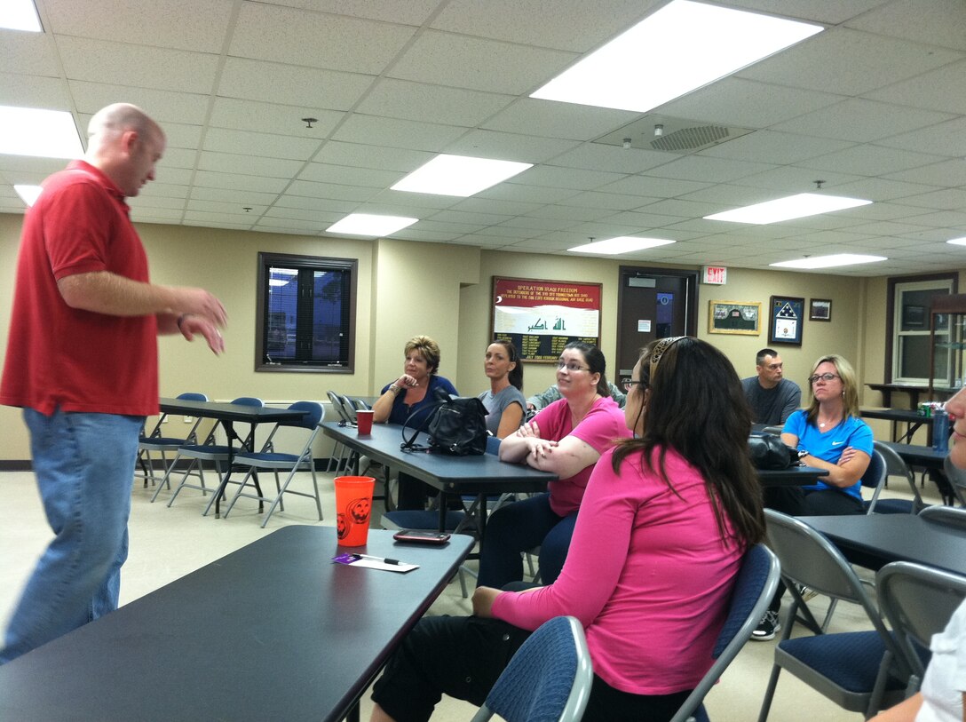 Special Agent Corey Christman with the 910th Office of Special Investigations instructs a group of 910th reservists’ spouses at a self-defense class here. The class, which was requested by members of the Key Spouse Program, included instruction in situational awareness, characteristics of attackers and sexual predators as well as basic self-defense techniques. The Key Spouse Program is a support network for spouses of reservists intended to help Airman and Family Readiness and take care of military families. 