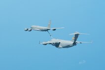 A KC-135R Stratotanker from the 916th Air Refueling Wing refuels a C-17 Globemaster from the 315th Airlift Wing on Sept. 15, 2011. (USAF courtesy photo)