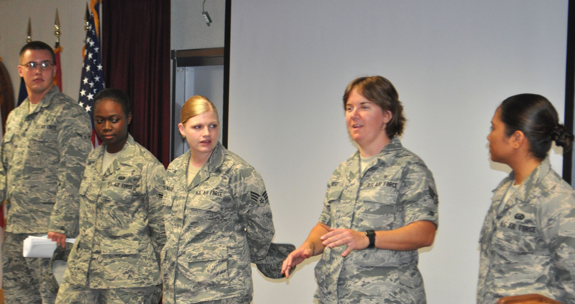 TRAVIS AIR FORCE BASE, Calif. -- A panel of five young Airmen discuss basic military training readiness with the first class of the new Reserve Training Flight at Travis AFB Sept. 10. The Air Force Reserve has stood up five training flights at various bases to better prepare delayed enlistment trainees for BMT and beyond. From the left: Airman Jacob Rice, 349th Aeromedical Evacuation Squadron, Amn. 1st Class Ashley Hayes, 312th Airlift Squadron, Senior Amn. Amelia Leonard, 349th AMW public affairs, SrA holly Kiesz, 349th Aeromedical Staging Squadron, and Airman Basic Janelle Acain, 349th Force Support Squadron. (U.S. Air Force photo/Senior Master Sgt. Ellen L. Hatfield)