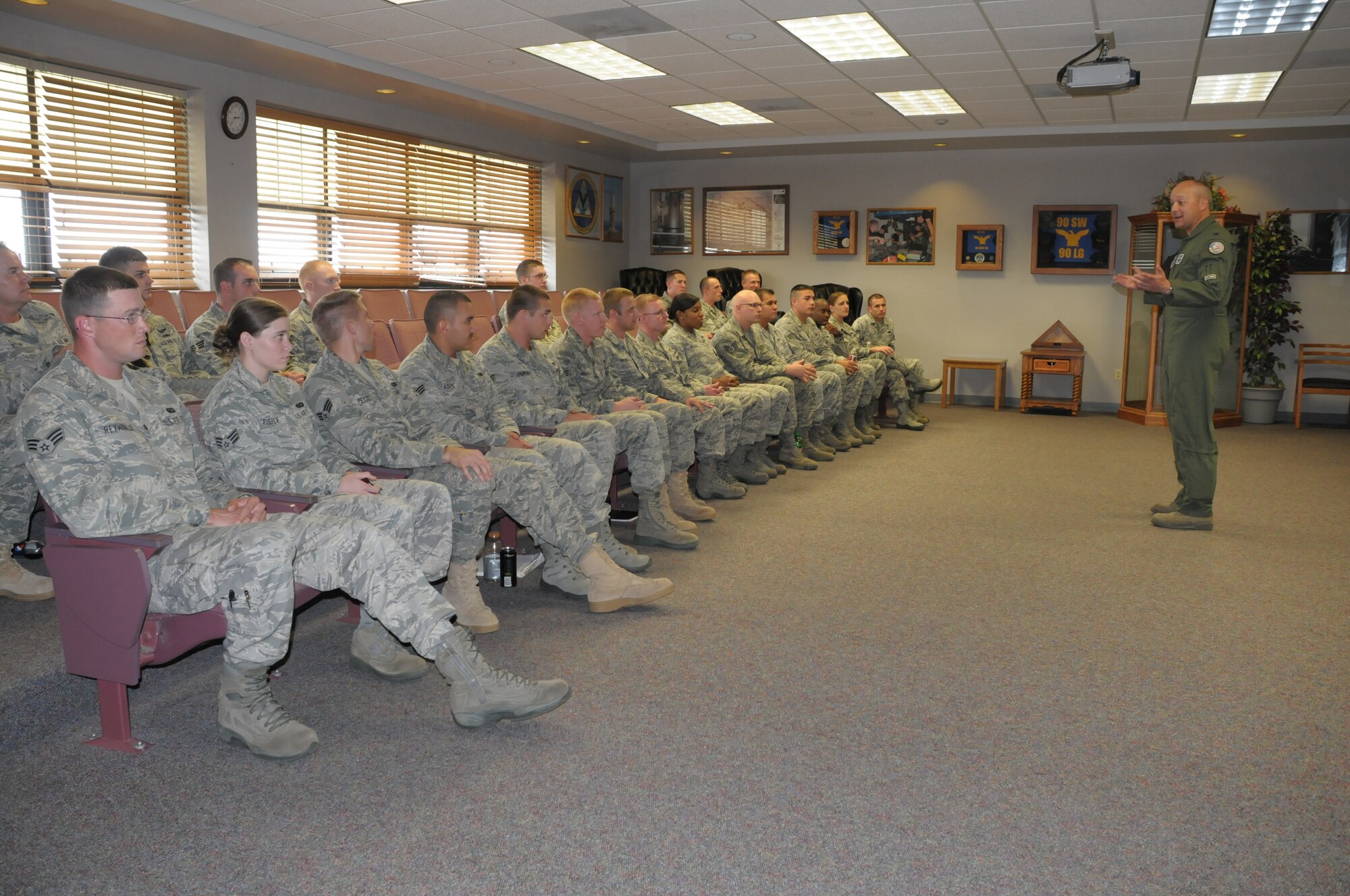 Col. Christopher Coffelt, 90th Missile Wing commander, speaks to Airman Leadership School class 11-G on the importance of becoming a leader. (U.S. Air Force photo by Blaze Lipowski)