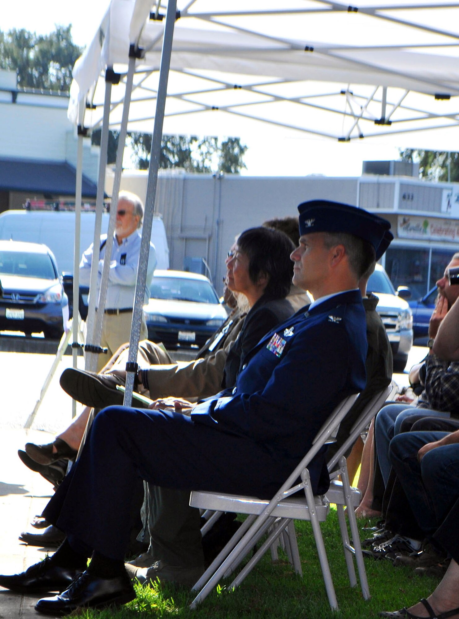 TRAVIS AIR FORCE BASE, Calif. --349th Operations Group Commander, Col. Al Lupenski, listens intently to Mel Raimundo tell his story about being a prisoner of war during World War II. The colonel, other Travis leaders, and Airmen, turned out in force to honor Solano County POWs and missing in action heroes at Vacaville's Sept. 16 National POW/MIA Recognition Day ceremony. Raimundo spent five months as a "guest" of the Germans in Stalag 4B, after many days of forced marching in the freezing winter of 1944-45. When finally released and repatriated, he weighed 90 pounds. (U.S. Air Force photo/Senior Master Sgt. Ellen L. Hatfield)