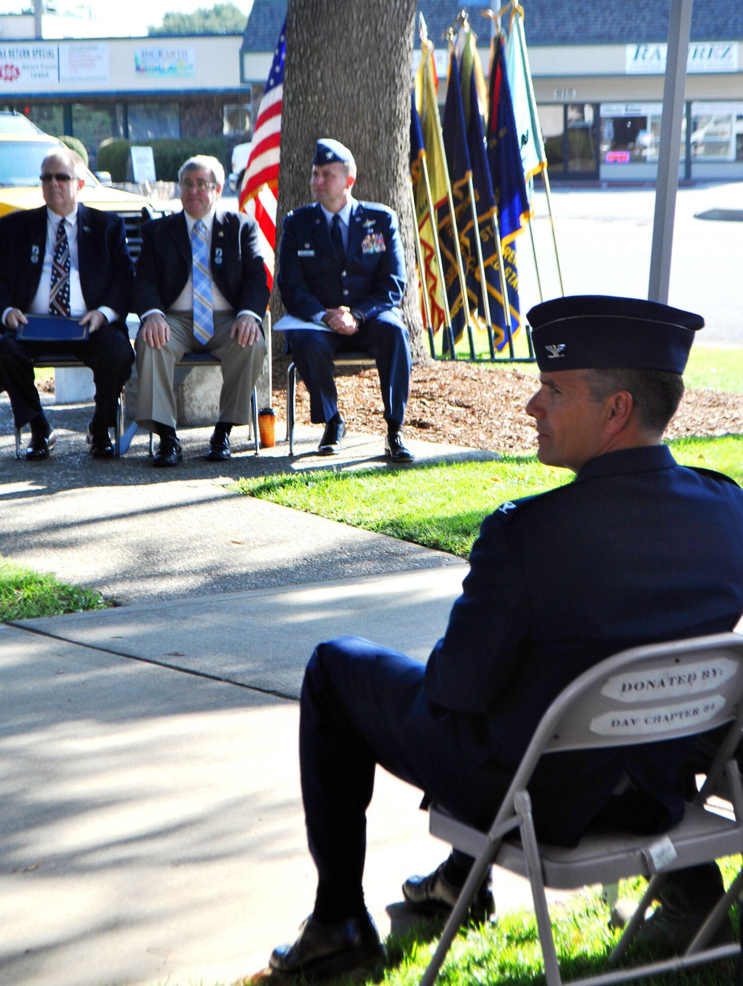 TRAVIS AIR FORCE BASE, Calif. --Travis AFB leadership and Airmen were out in force Sept. 16, 2011, National POW/MIA Recognition Day. Attending the Vacaville, Calif., ceremony were, foreground, Reservist Col. Al Lupenski, 349th Operations Group commander, and background, Col John Millard, 60th Operations Group commander. There are still 83,000 Soldiers, Sailors, Airmen, Marines and Coast Guardsmen unaccounted for since World War II. (U.S. Air Force photo/Senior Master Sgt. Ellen L. Hatfield)