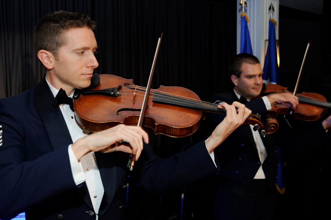 Master Sgts. Bryce Bunner and Will Hurd and other members of The U.S. Air Force Strolling Strings serenade the audience with "Somewhere Over the Rainbow."