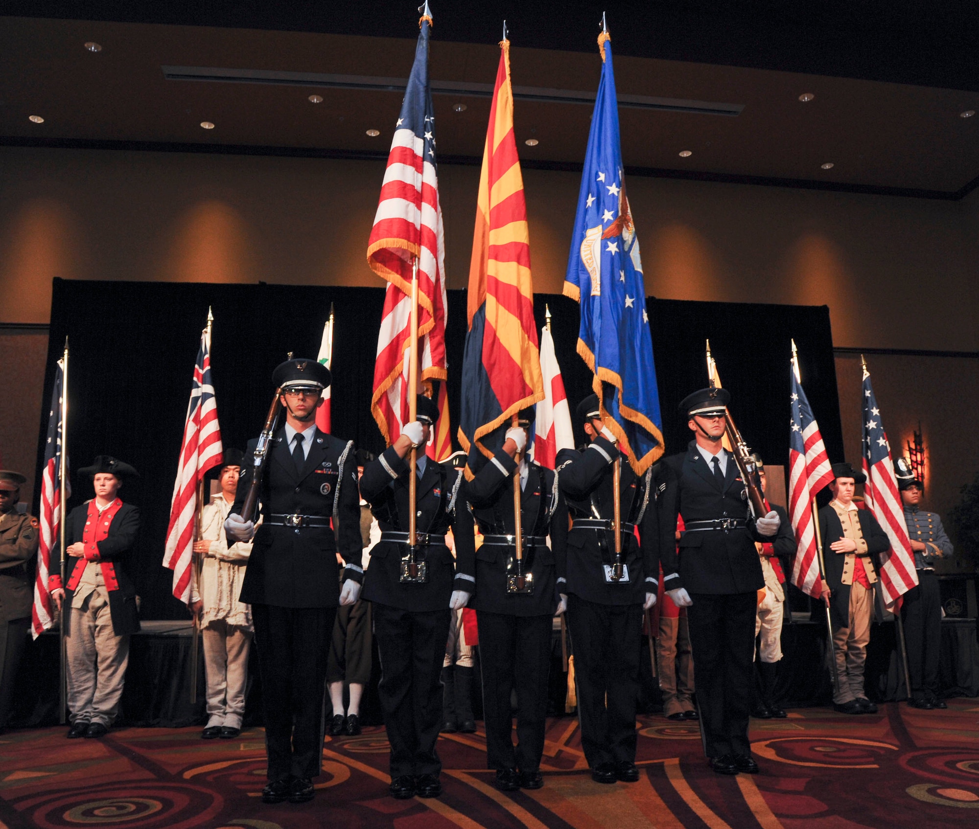 Members of the Luke Air Force Base Honor Guard and the Aqua Fria High School Junior Reserve Officer Training Corps perform the Pageant of the Flags at the Air Force Ball. (U.S. Air Force photo by Senior Airman Darlene Seltmann)
