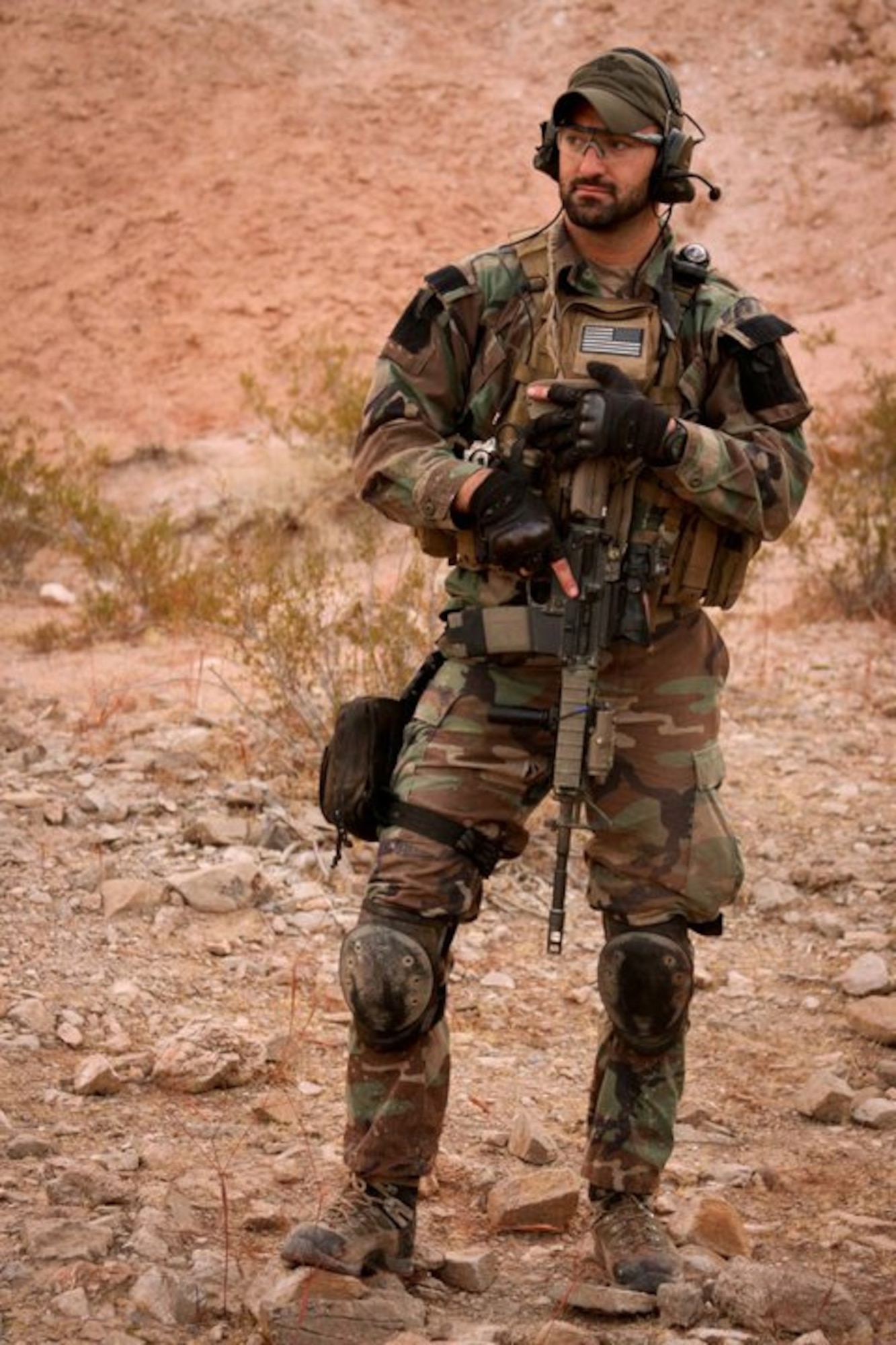 PATRICK AIR FORCE BASE, Fla. - Staff Sgt. Dan Warren, Air Force Reserve pararescueman, trains in the desert of Las Vegas, Nevada. Sgt. Warren was part of a Guardian Angel Team who saved 15 lives and helped 49 others to safety after an avalanche devastated a mountain pass in Afghanistan. (U.S. Air Force photo)