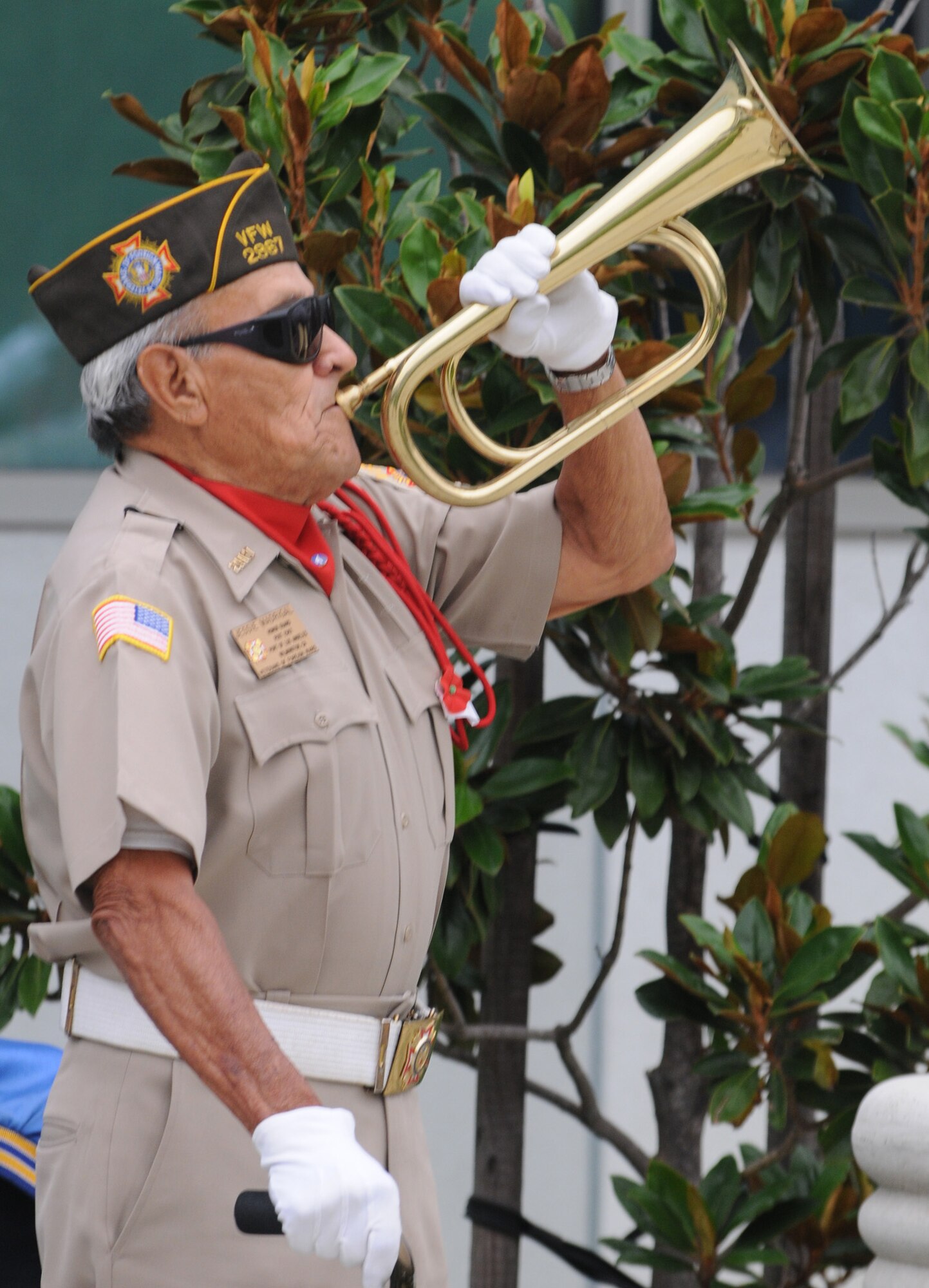 A bugler from VFW Post 2967 plays during the wreath laying ceremony, Sept. 16. (Photo by Joe Juarez)