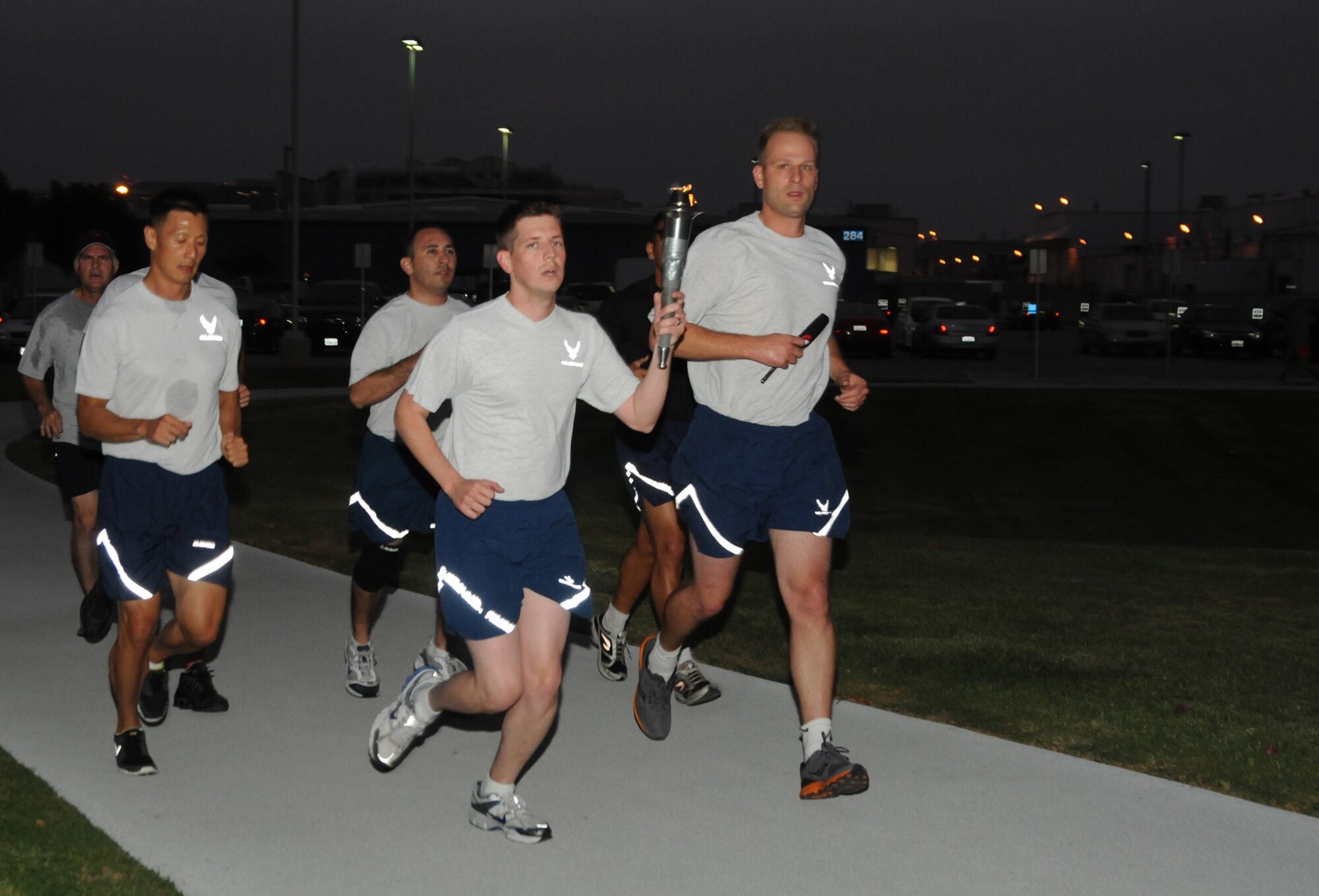 Runners ran around the LAAFB track through the night.  (Photo by Joe Juarez)