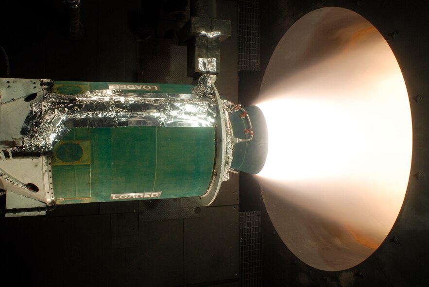A Minuteman III Stage 3 motor undergoes simulated altitude testing in AEDC’s J-6 Large Rocket Test Facility. It was the second of two Production Quality Assurance (PQA) Minuteman rocket motors scheduled for testing in fiscal year 2011. These tests support Hill AFB and the Minuteman Solid Rocket Motor Warm Line (SRMWL) program.  The SRMWL program is intended to sustain and maintain the unique manufacturing and engineering infrastructure necessary to preserve the Minuteman III solid rocket motor production capability. The customer will compare the motors performance parameters to the results of previous Production Quality Assurance (PQA) static tests and verify that the motors meet the requirements in the Prime Item Fabrication Specification (PIFS). (Photo by Rick Goodfriend)