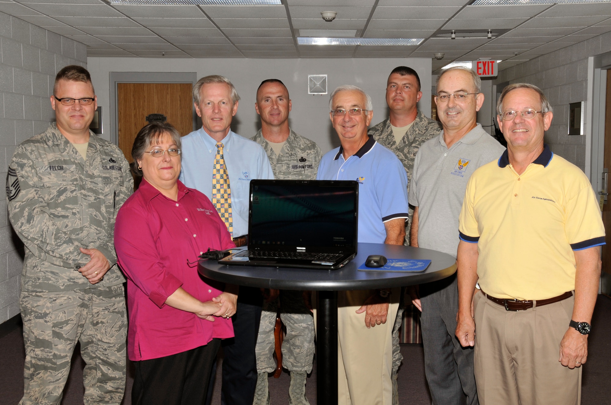 McGHEE TYSON AIR NATIONAL GUARD BASE, Tenn. - Members of The I.G. Brown Air National Guard Training and Education Center honor the local Gen. Bruce K. Holloway Air Force Association Chapter for their contributions to the new wireless internet capability at the lodging facilities of the McGhee Tyson Inn during a ceremony held here, Sept. 1, 2011.  From L-R are Chief Master Sgt. Donald E. Felch, Lankford EPME Center commandant; Pam Christian, McGhee Tyson Inn manager; Steve Billenburg, AFA; Senior Master Sgt. Jeff Watson, logistics manager; Joe Sutter, AFA; Master Sgt. Jason Wolfe, network manager; Marty Coffman, AFA; and Jim Mungenast, AFA.  (U.S. Air Force photo by Master Sgt. Kurt Skoglund/Released)