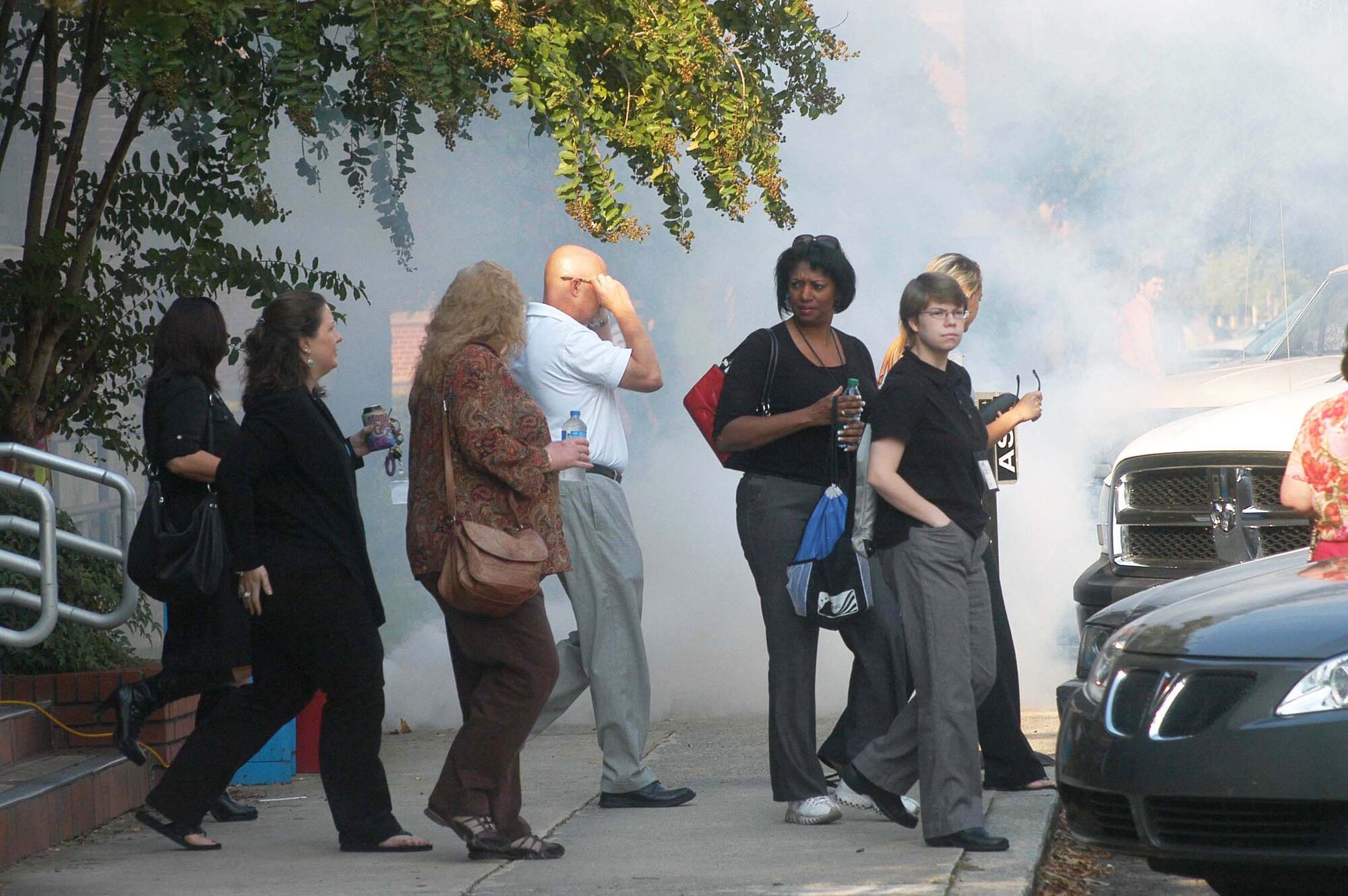 Employees in Bldg. 301 evacuate during a simulated structure fire Sept. 15. U. S. Air Force photo by Sue Sapp