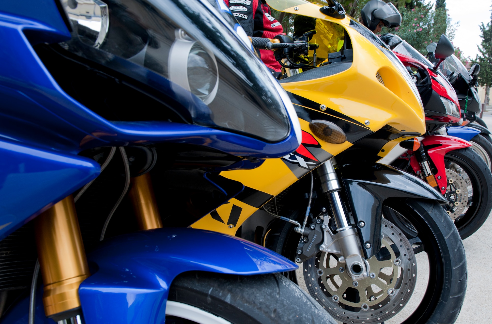 Motorcycles sit lined up from the Green Knights motorcycle club after a weekly meeting Sept. 23, 2011, at Incirlik Air Base, Turkey. The club was formed in late 1999 and were formally recognized in 2000 at Joint Base McGuire-Dix-Lakehurst, N.J. (U.S. Air Force photo by Senior Airman Anthony Sanchelli/Released)
