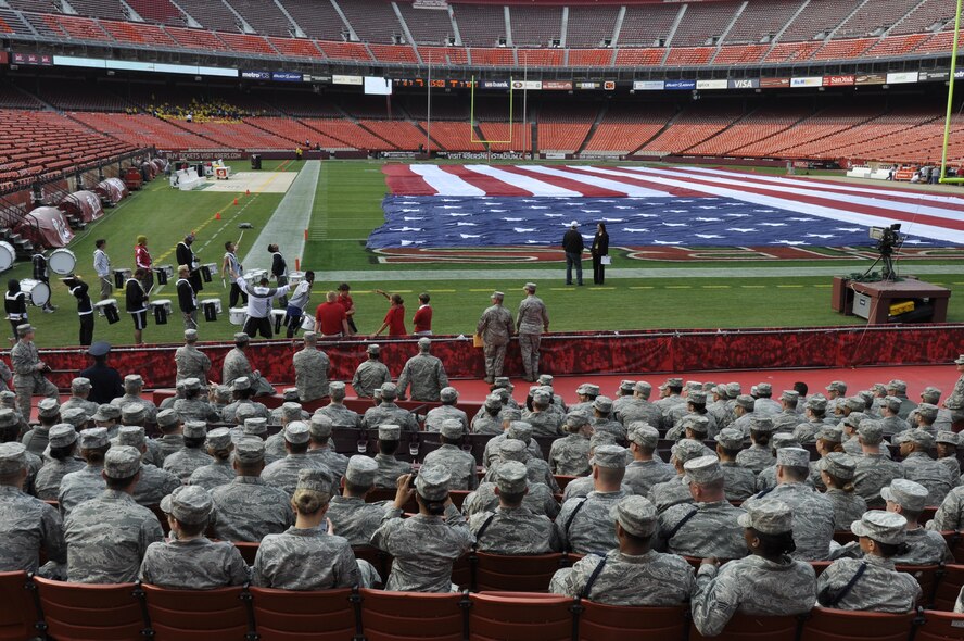 California Air National Guardsmen from the 129th Rescue Wing at Moffett Federal Airfield, Calif., and Airmen from Travis Air Force Base, in Fairfield, Calif., sit in on the rehearsal for the San Francisco 49ers drum group "Niner Noise" at Candlestick Park in San Francisco, Sept. 11, 2011. The Airmen participated in a pre-game flag ceremony to commemorate the tenth anniversary of 9/11 at the 49er 2011 season opener against the Seattle Seahawks. (Air National Guard Photo by Airman 1st Class John Pharr)
