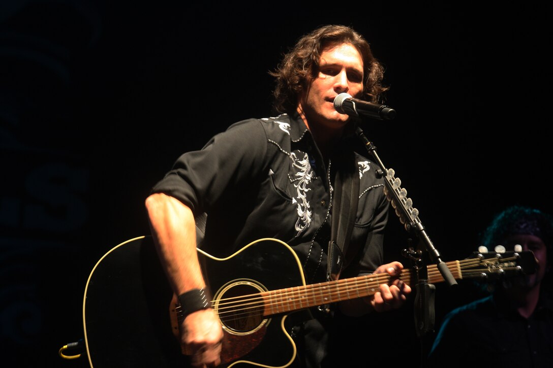 Joe Nichols, a country music singer, harmonizes the lyrics of “Gimme That Girl” to the energetic crowd of the North Carolina Country Music Freedom Festival at the Deppe Agriculture and Music Pavilion in Maysville, N.C., Sept. 24. The festival, which included a day-long concert of various country music notables, was in support of the upcoming Corpsmen Memorial to be constructed in front of the planned Museum of the Marine, with all proceeds going toward the memorial foundation.