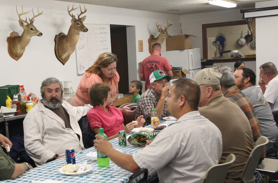 Hunters eat lunch during a sign-up for the weekly group hunts hosted by the John A. Lejeune Rod and Gun Club aboard Marine Corps Base Camp Lejeune, Saturday. The group hunts will start Oct. 29 and end Dec. 31.