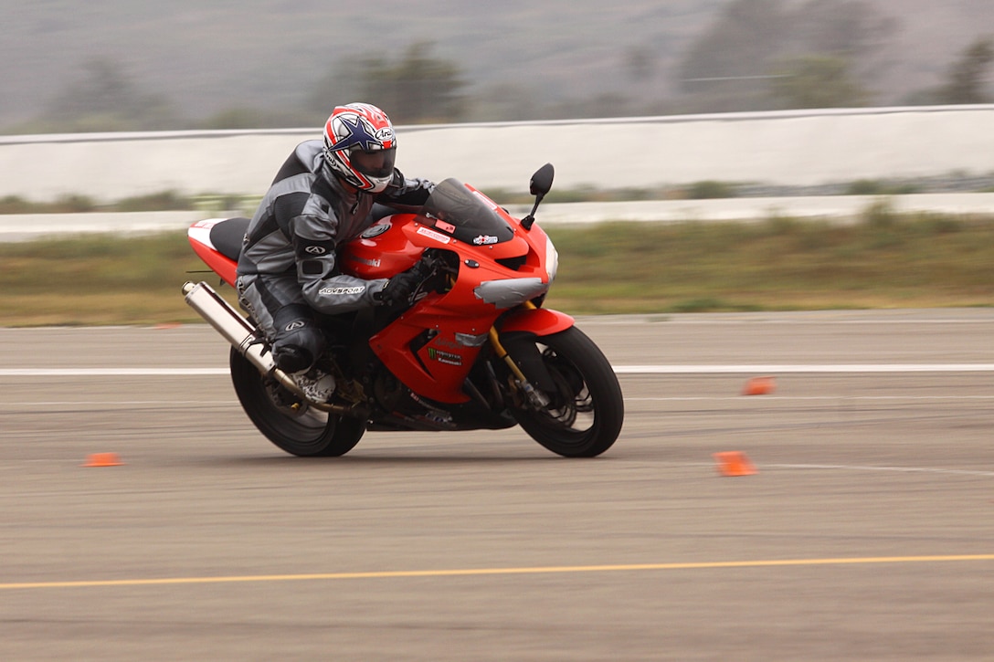 A motorcyclist races down the runway during the second “Fun Day on the Runway,” at Camp Pendleton’s Marine Corps Air Station, Sept. 24. The motorcycle track day, training and safety event hosted by Semper Ride, featured classes and clinics on bike safety, ramp and street freestyle demonstrations, a bike show competition and vendors to educate Marines, sailors and their family members about motorcycle safety.