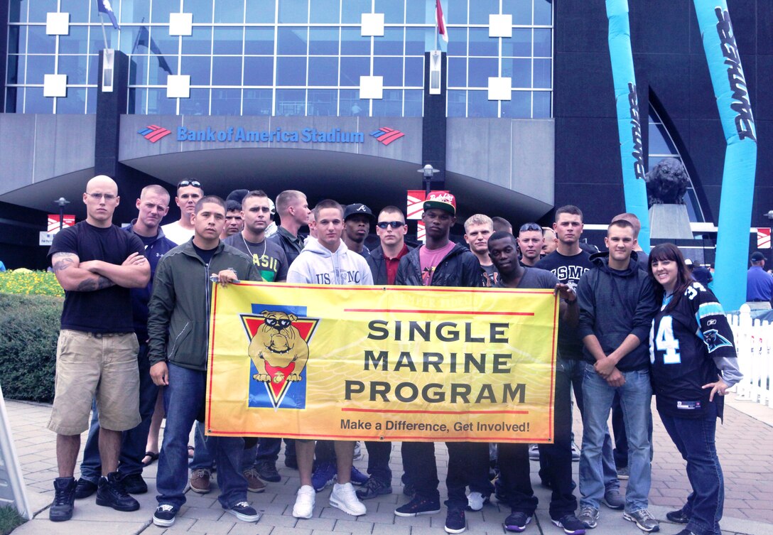 Members of the Single Marine Program aboard Marine Coprs Base Camp Lejeune and Camp Johnson gather together outside the Bank of America Stadium in Charlotte, N.C. The SMP group recently attended a Carolina Panthers' football game.