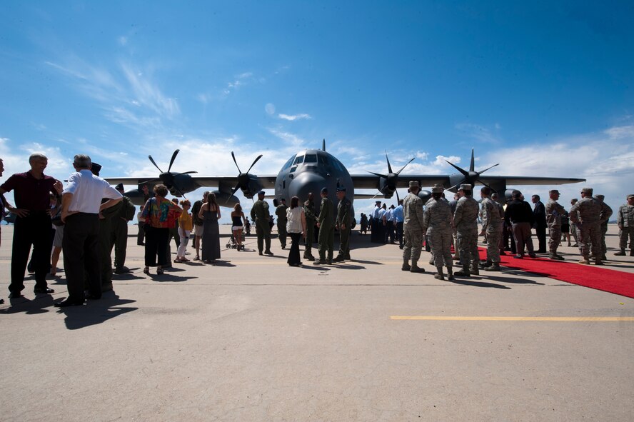 Patrons to the HC-130J Combat King IIs arrival ceremony on Davis-Monthan Air Force Base, Az., Sept. 24, 2011 view the aircraft after the ceremony. The HC-130J Combat King II will replace the HC-130P/Ns as the only dedicated fixed-wing personnel recovery platform in the Air Force inventory. Majority of the aircraft's operating systems have been improved which will aid the 79th Rescue Squadron, the receiving squadron, to perform their mission more efficiently than they could with the current generation aircraft. (U.S. Air Force photo by Staff Sgt. Joshua J. Garcia/Released))