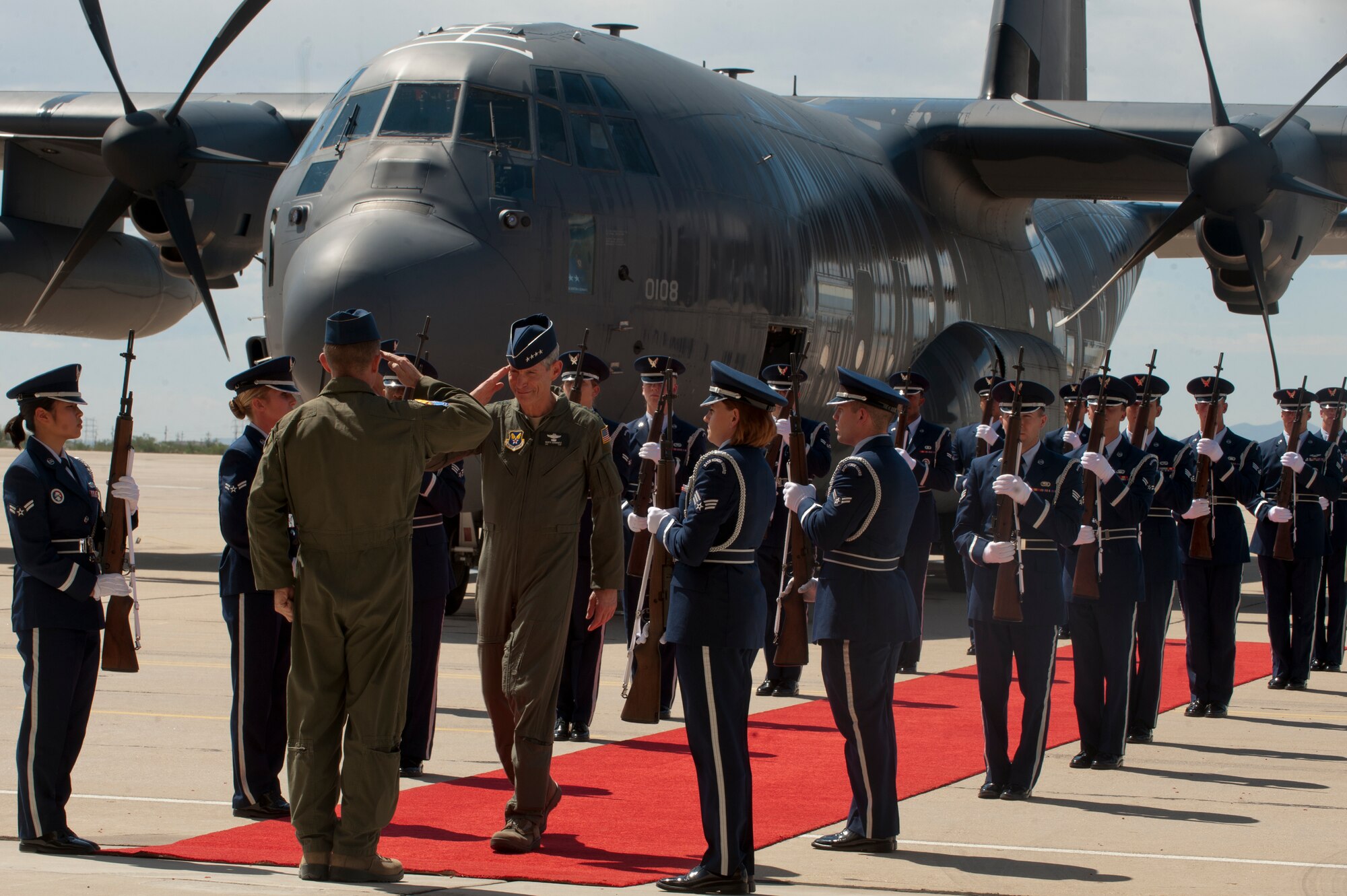 U.S. Air Force Chief of Staff Gen. Norton Schwartz, is greeted by U.S. Air Force Col. John A. Cherrey, 355th Fighter Wing commander, after arriving to Davis-Monthan Air Force Base, Az., in the new HC-130J Combat King II for the aircraft's arrival ceremony on Sept. 24, 2011. Schwartz piloted the aircraft from the Lockheed Martin Aerospace Company, Marietta, Ga. to Davis-Monthan for the ceremony. (U.S. Air Force photo
by Staff Sgt. Joshua J. Garcia/Released)