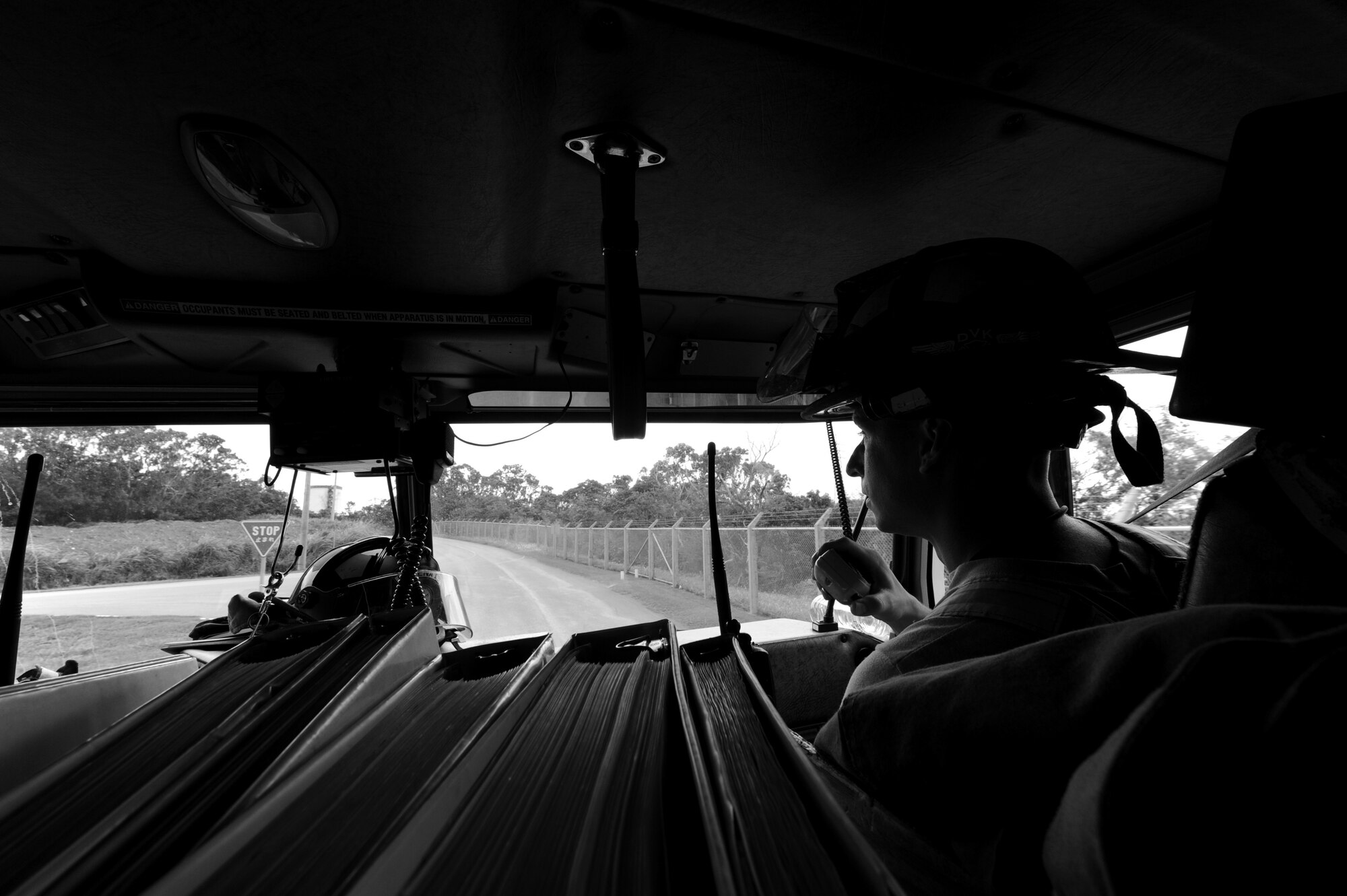Staff Sgt. Robert Jarvis, 18th Civil Engineer Squadron fireman, responds to a call from another firefighter on Kadena Air Base, Japan, Sept. 21. Jarvis and the other firemen assigned to Fire Station 1 on Kadena provide medical and emergency services to members on Kadena, Camp Shield, Torri Station and Chibana housing. (U.S. Air Force photo/Airman 1st Class Jarvie Z. Wallace) 
