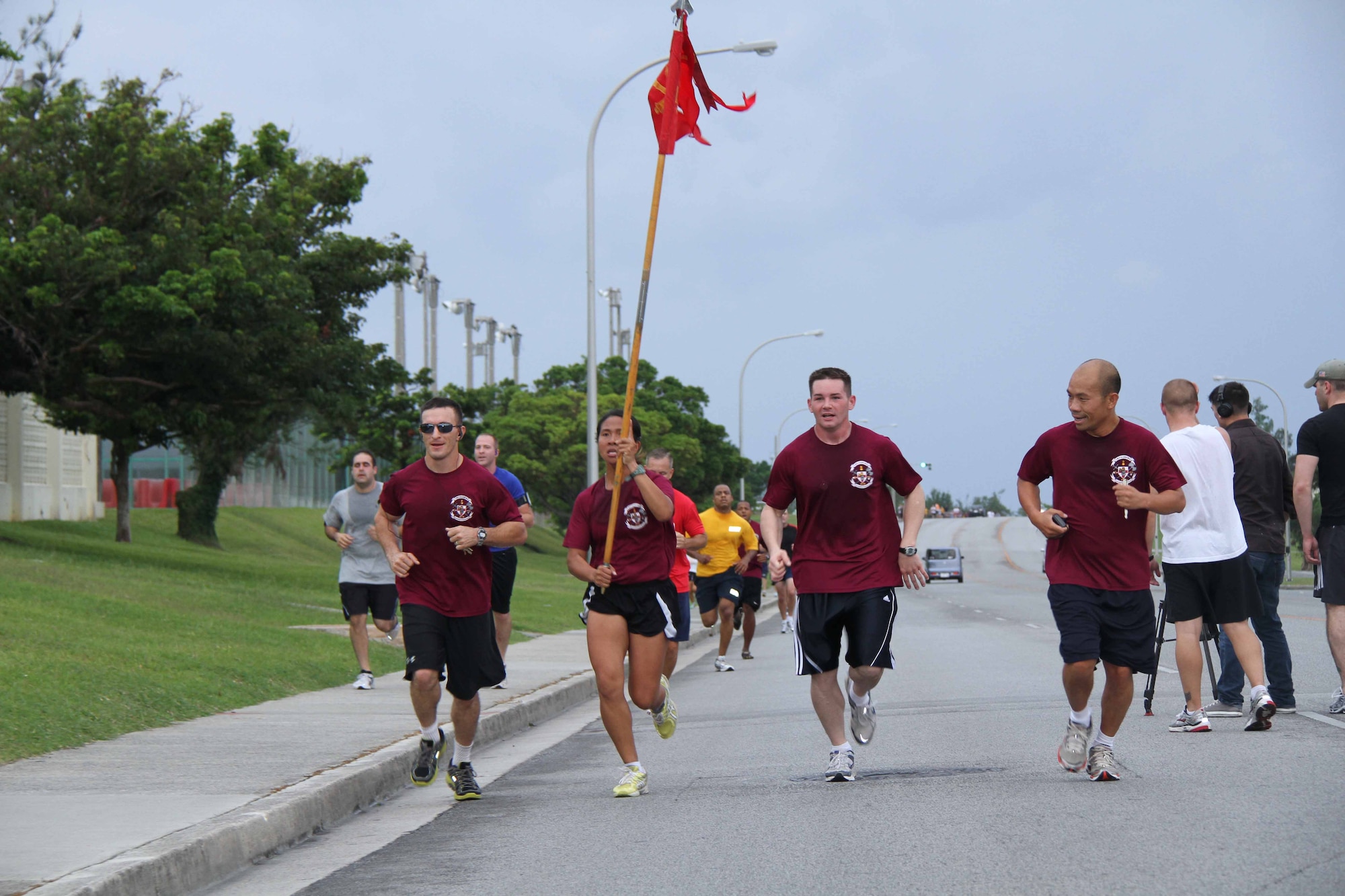 Members of the U.S Army's 1st Battalion 1st Air Defense Artillery (regiment) Echo Company participate in the Kadena Special Olympics Fun Run at Kadena Air Base, Japan, Sept. 24. More than 400 Airmen, Soldier, Sailors and Marines joined together with civilian to participates in the 12th Annual Kadena Special Olympics Fun Run. Kadena Special Olympics is the largest community outreach program in the pacific with close to 1,300 special-needs athletes and artists from 44 schools on the island. (U.S. Army photo/Chip Steitz)
