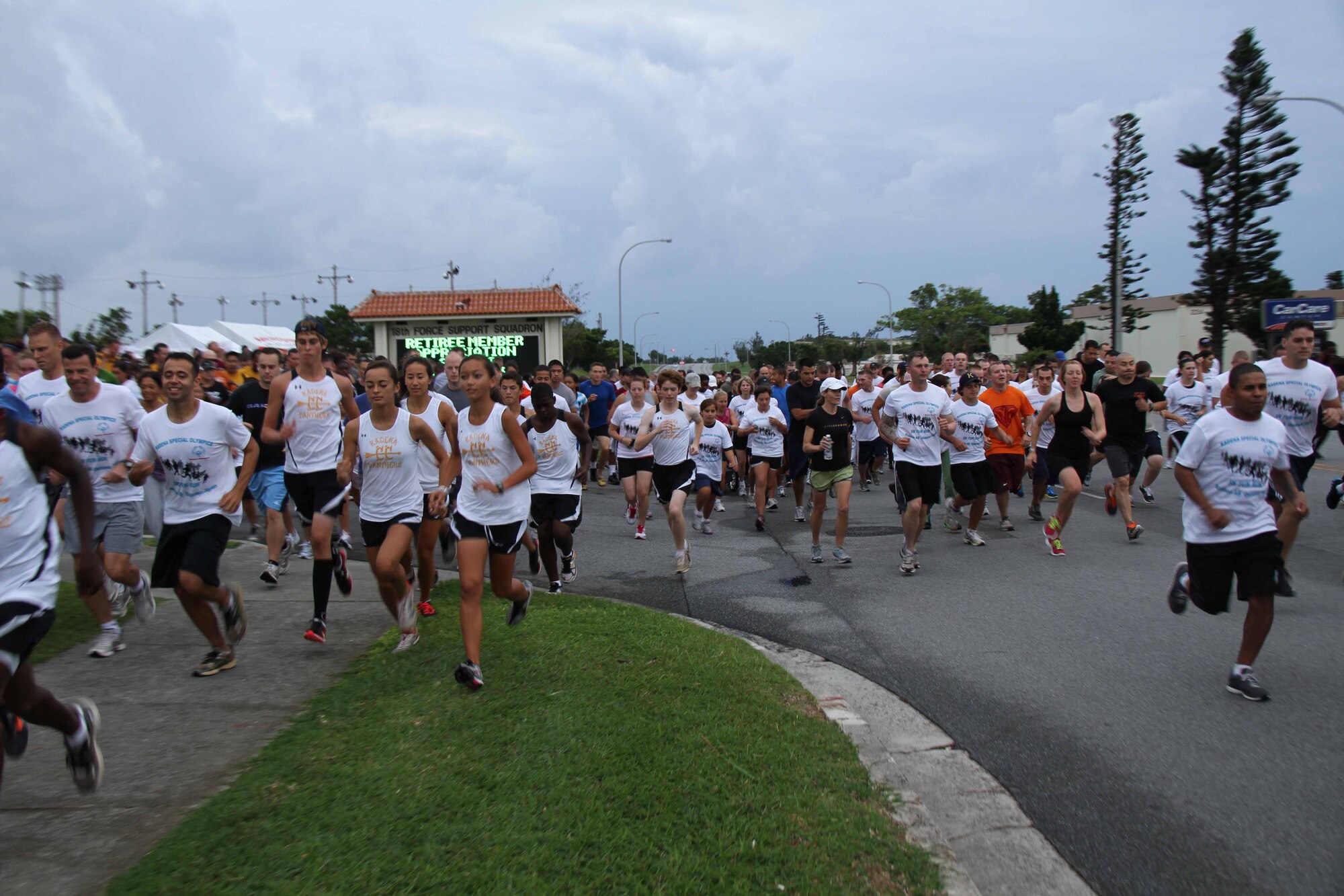 More than 400 Airmen, Soldier, Sailors, Marine and civilians participate in the 12th Annual Kadena Special Olympics Fun Run at Kadena Air Base, Japan, Sept.24. Kadena Special Olympics is the largest community outreach program in the pacific with close to 1,300 special-needs athletes and artists from 44 schools on the island. (U.S. Army photo/Chip Steitz)
