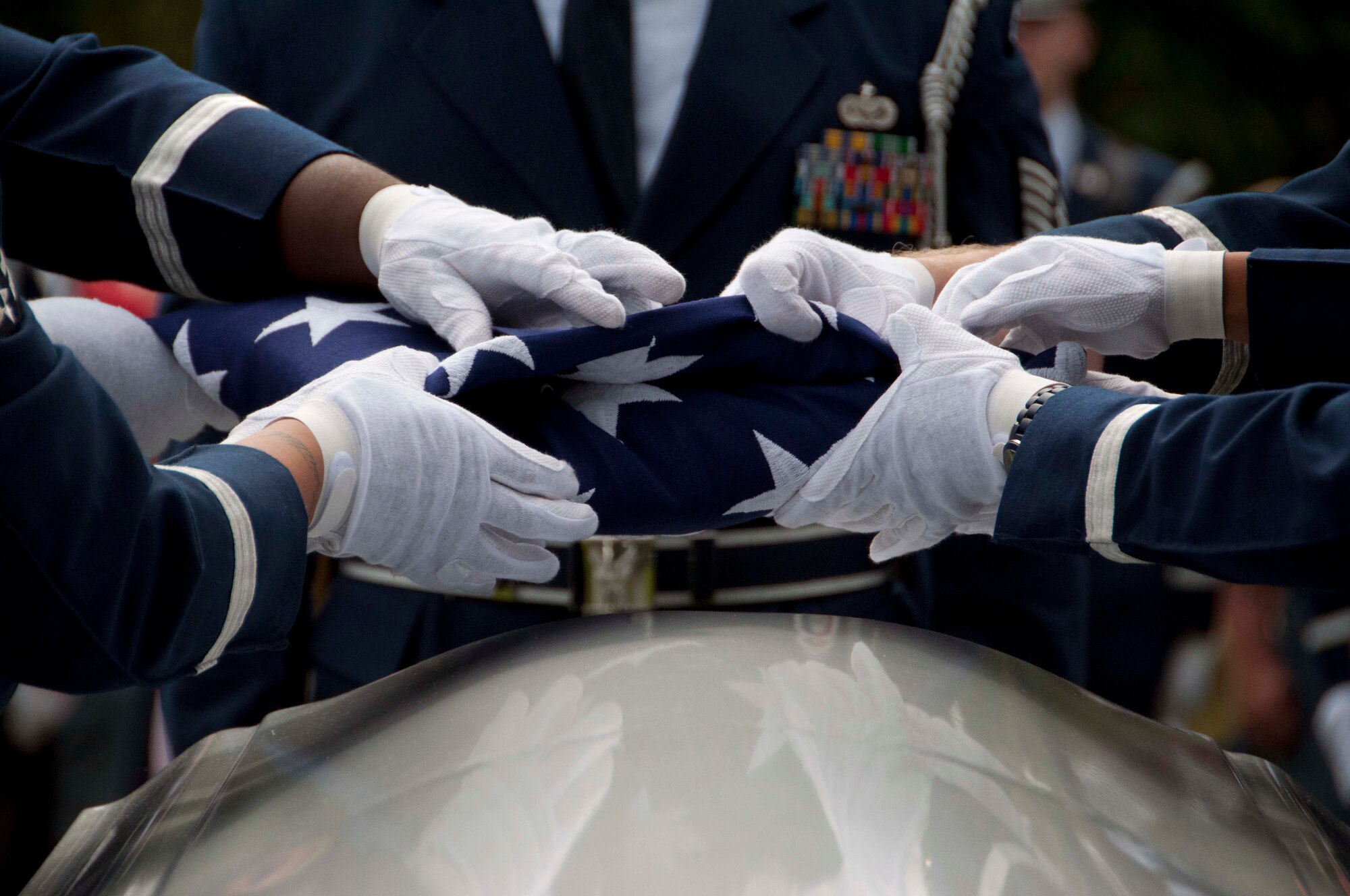 An Air Force honor guard team from Joint Base McGuire-Dix-Lakehurst, N.J., participates in a burial ceremony honoring Maj. Bruce Lawrence Sept. 24, 2011 at a cemetery in Easton, Pa., approximately 43 years after his aircraft was shot down in Vietnam. Lawrence’s remains were recovered and positively identified through the Joint POW/MIA Accounting Command. (U.S. Air Force photo/2nd Lt. Michael Gibson)
