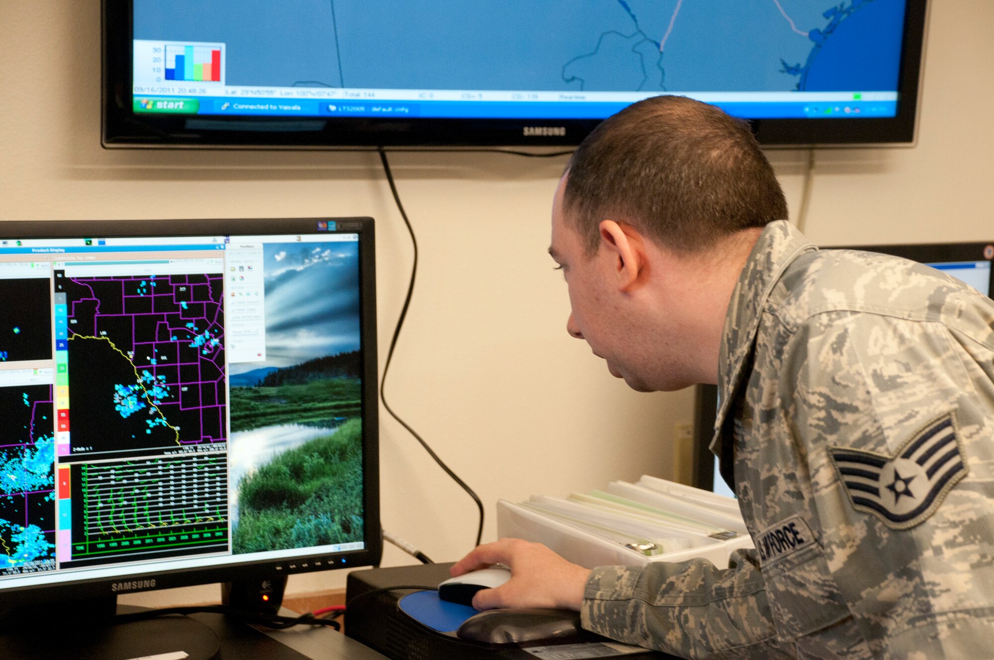 LAUGHLIN AIR FORCE BASE, Texas – Staff Sgt. Thomas Jenkins, 47th Operations Support Squadron Weather Flight NCO in charge of weather systems, monitors the weather here Sept. 16. Jenkins recently developed a formula to increase dust storm forecasts accuracy from 10 to 80 percent. The Air Force recognized this achievement and are scheduled to begin training personnel and distributing to areas of responsibility that will benefit from the new tool. (U.S. Air Force photo/Senior Airman Scott Saldukas) 