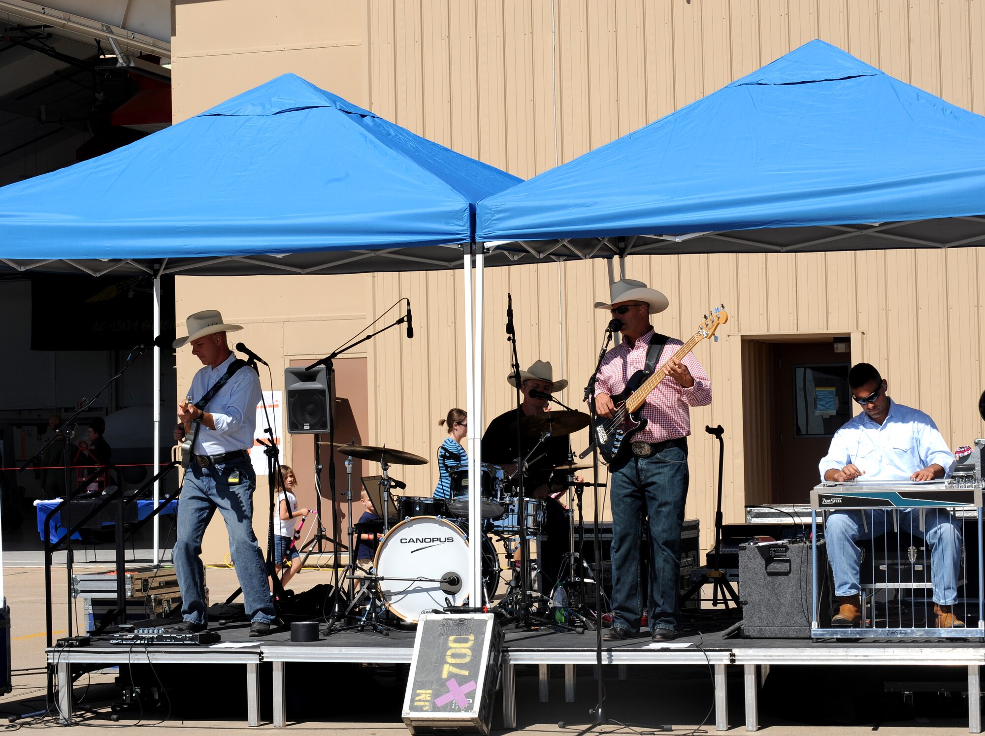 U.S. Air Force Academy Wild Blue Country band performs during the second annual open house at Cannon Air Force Base, N.M., Sept. 24, 2011. The Wild Blue Country Air Force Band also goes overseas to support our troops and tell the Air Force story throughout the nation.  (U.S. Air Force photo by Airman 1st Class Xavier Lockley) 