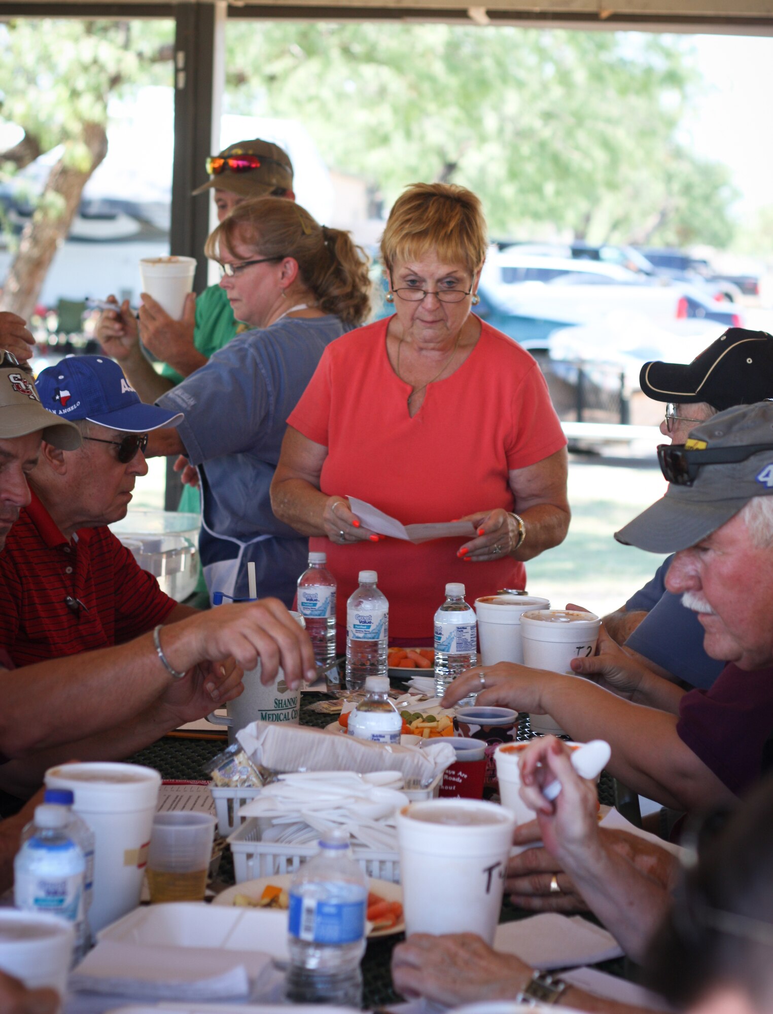 SAN ANGELO, Texas -- Laura Coad, a representative with Tolbert Chili Group, instructs the judges on the five criteria used to rank the chili: color, smell, consistency, taste and after-taste, during the 38th Annual Armed Forces Chili Cookoff at the Recreation Camp Sept 24. Coad has been going to the chili cookoff since 1989. (Courtesy photo/Whitney Haskell)