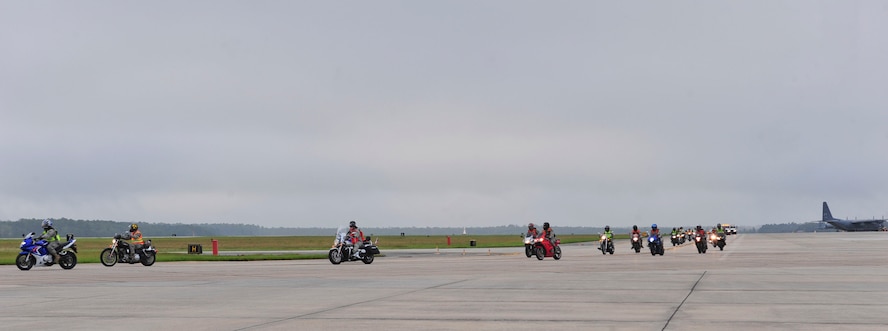 Team Moody motorcyclists ride their bikes on the flightline after an annual post-season safety briefing at Moody Air Force Base, Ga., Sept. 23, 2011. More than 40 motorcyclists participated in the flightline ride. (U.S. Air Force photo by Senior Airman Stephanie Mancha/Released) 