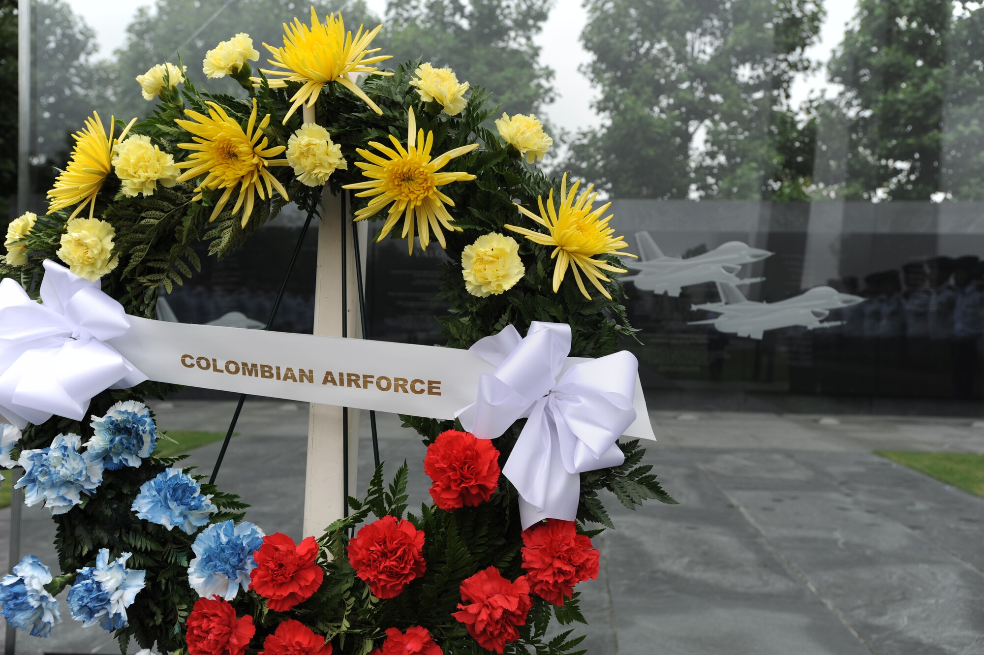 Brig. Gen. Del Aire Raul Torrado Alvarez, Colombian Air Force Academy director, presented a wreath at the U.S. Air Force Memorial to honor fallen servicemembers of the U.S. and it's allies Sept. 26, Arlington, Va. A wreath with yellow, red and blue colors representing the Colombian flag, was presented by Alverez and more than 60 of his Colombian Air Force cadets.  (U.S. Air Force photo by Staff Sgt. Christopher Ruano)