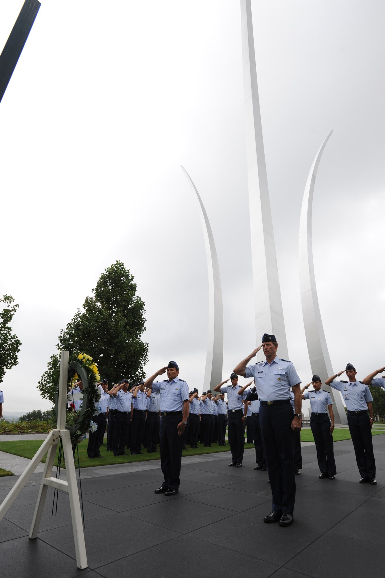 Brig. Gen. Del Aire Raul Torrado Alvarez, Colombian Air Force Academy director, and Col. Tim Carey, deputy director, regional affairs, office of the deputy under secretary of the Air Force, international affairs, pay respects to fallen soldiers during a wreath laying at the U.S. Air Force Memorial Sept. 26, Arlington, Va. “The wreath laying here today is a symbol of the camaraderie shared by airmen worldwide,” said Carey. (U.S. Air Force photo by Staff Sgt. Christopher Ruano)