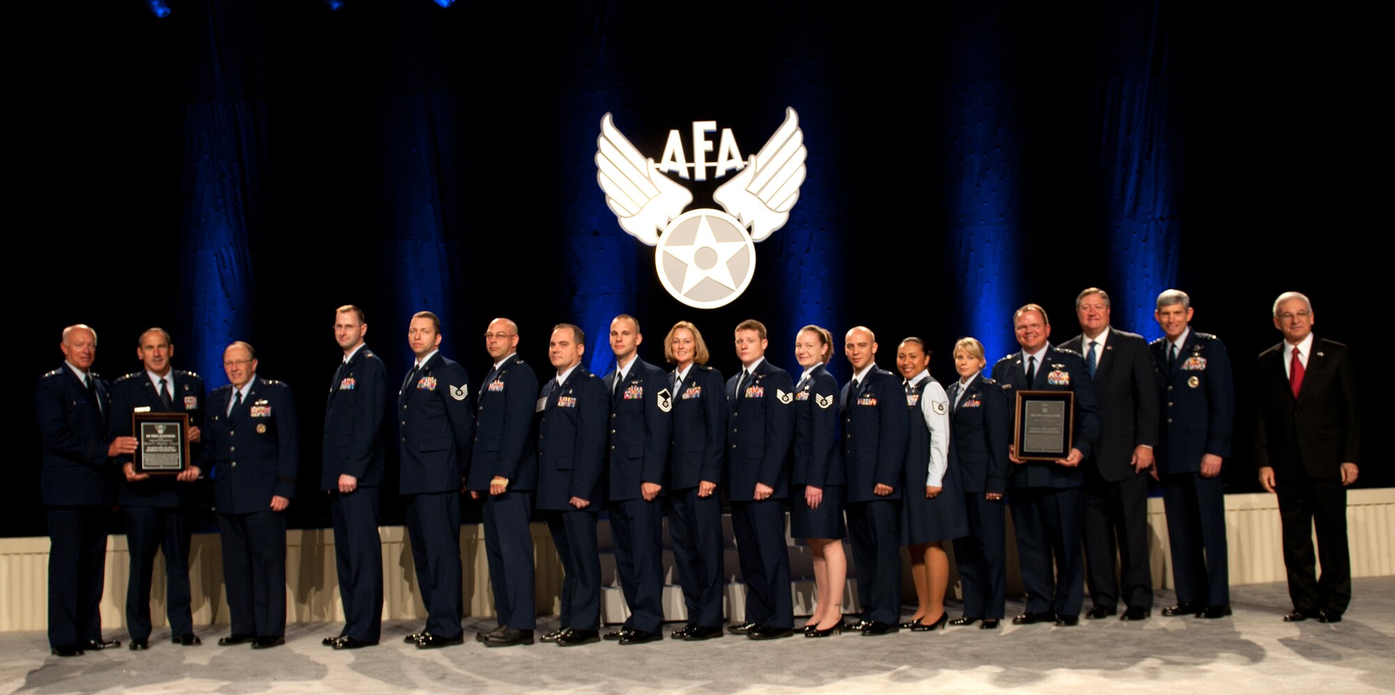 Air Force leadership poses with award acceptees during the the Air Force Association banquet at the Gaylord National Hotel and Convention Center, National Harbor, Md., Sept. 18, 2011. Lt. Col. Michael Gainer and Staff Sgt. Krystil Reinstadler, both with the 446th Aeromedical Evacuation Squadron, represented the Air Force Reserve as the AFA presented the 2011 David C. Schilling Award to the Air Force aeromedical community. The David C. Schilling Award is presented for outstanding contributions to the field of flight.


 (U.S. Air Force photo by Charles Fazio)
