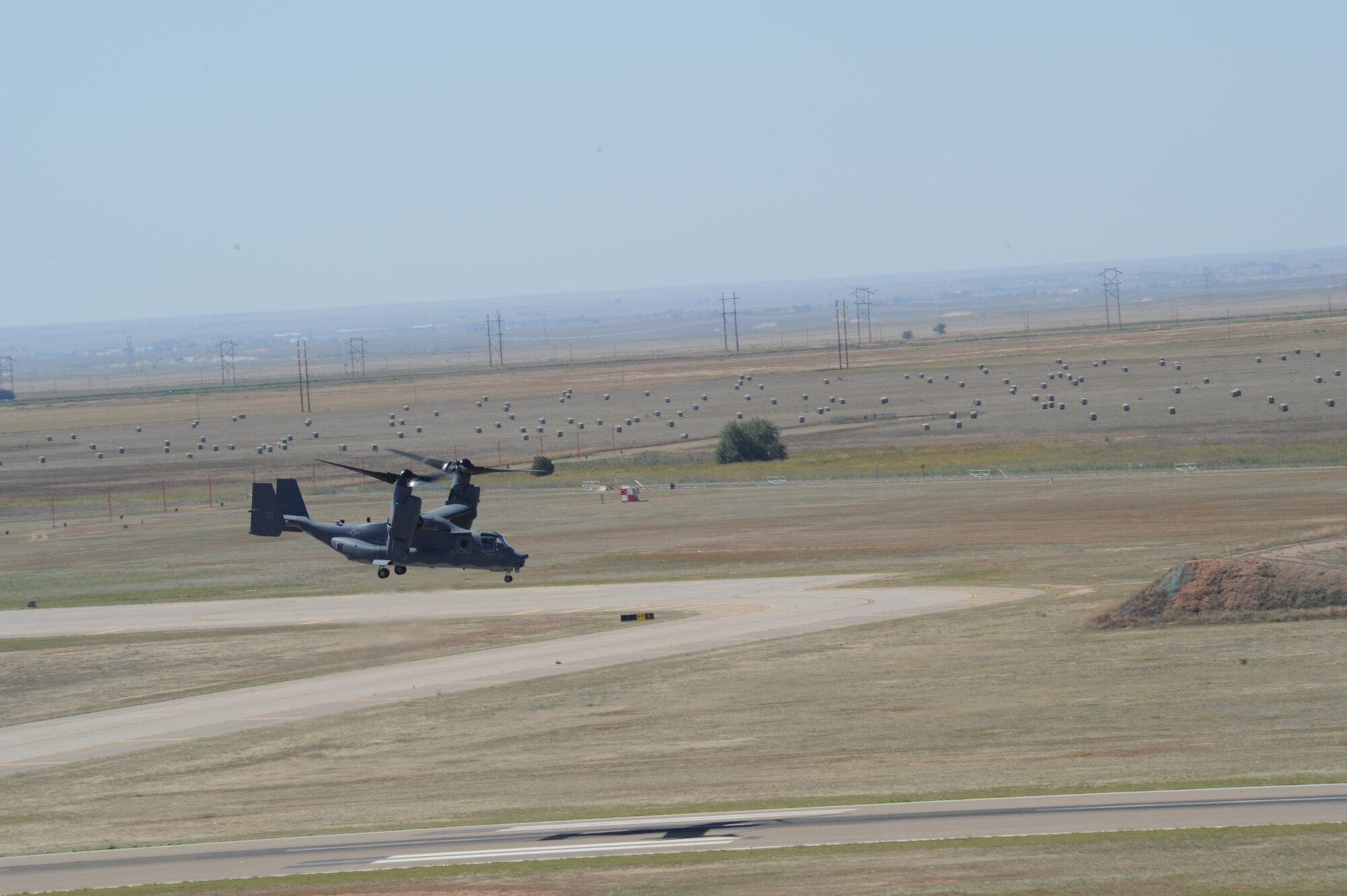 A 20th Special Operations Squadron CV-22 Osprey takes off for the open house aerial review at Cannon Air Force Base, N.M., Sept. 24, 2011.  It was the second annual open house since the base became home to the 27th Special Operations Wing in October 2007.  (U.S. Air Force photo by Senior Airman James Bell)