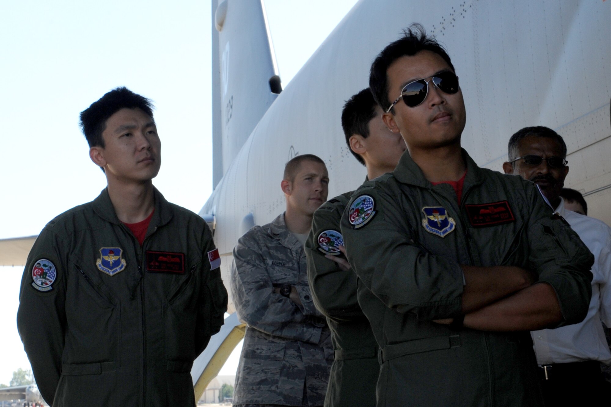 Personnel from the 425th Fighter Squadron (FS), who are on temporary duty at Barksdale Air Force Base, La., in support of a Green Flag exercise, get a tour of a B-52 Stratofortress, Sept. 23, 2011. The 425th FS, assigned to Luke Air Force Base, Ariz., provides advanced weapons and tactics training for Republic of Singapore F-16 pilots and maintenance personnel. Green Flag is an exercise designed to prepare pilots for combined, air, ground and electronic threat environments. (U.S. Air Force photo by Master Sgt. Greg Steele/Released)