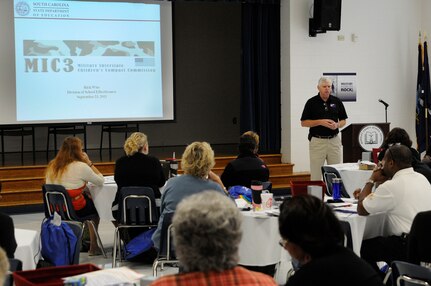 Troops to Teachers Program Manager Rick Wise speaks about the Military Interstate Children’s Compact Commission program during the Educator Boot Camp course at Joint Base Charleston-Weapons Station, Sept. 23. The course is designed to provide educators from Berkley, Charleston and Dorchester II County school districts ample amounts of resources that will further their knowledge about the military lifestyle and how to support military children. (U.S. Navy photo/Mass Communication Specialist 1st Class Jennifer Hudson)