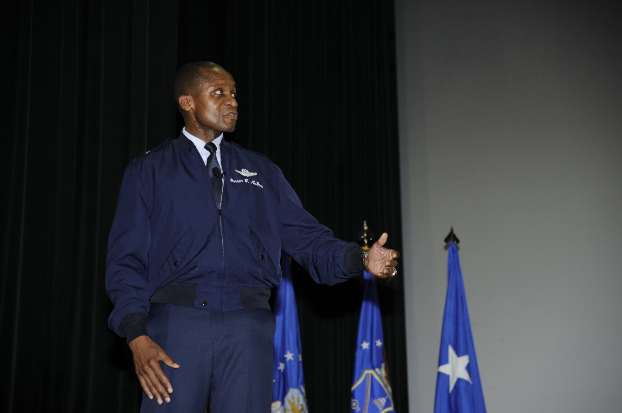 Maj. Gen. Darren McDew, Air Force District of Washington commander, briefs AFDW personnel about the Combined Federal Campaign Sept. 23 at Joint Base Andrews, Md. "You all made a decision to serve, this is just another way to serve," said McDew,” and the CFC makes it easy for you."  (U.S. Air Force photo by Staff Sgt. Christopher Ruano)