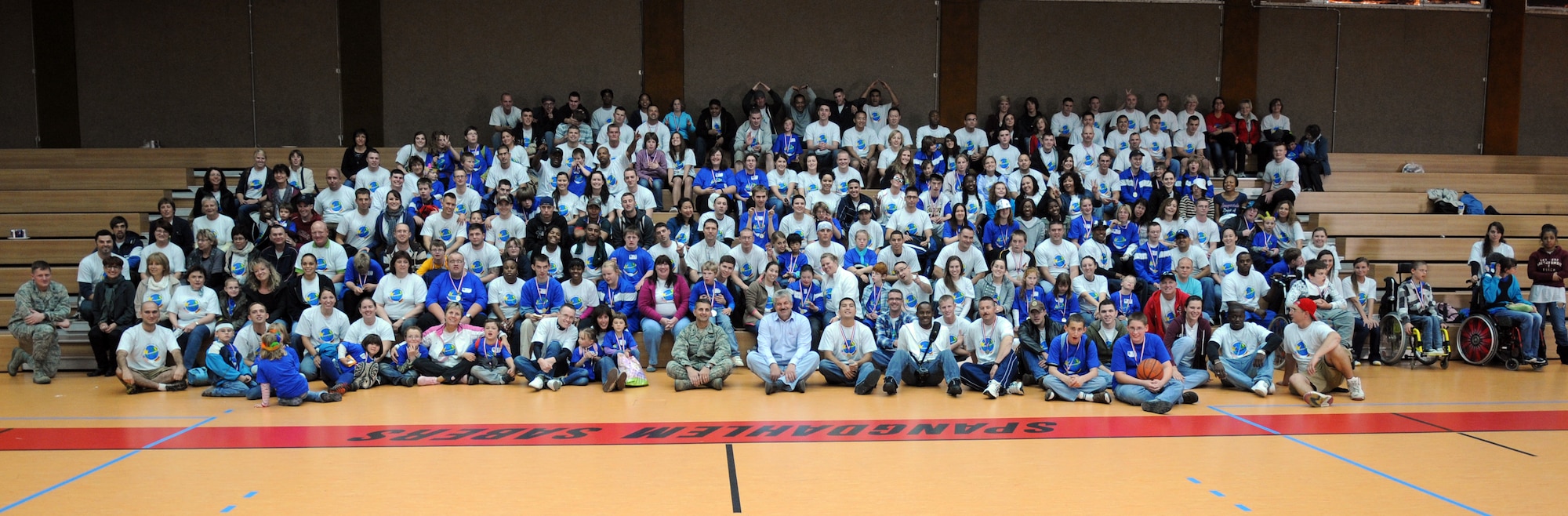 SPANGDAHLEM AIR BASE, Germany – Children from St. Martin’s School and members of Spangdahlem AB pose for a group photo after the St. Martin’s Special Children’s Day here Sept. 22. Airmen volunteered to run the activities as children and their buddies went through them. This is the 16th year Spangdahlem AB has hosted this German and American partnership building event with the Bitburg school. (U.S. Air Force photo/Senior Airman Christopher Toon) 