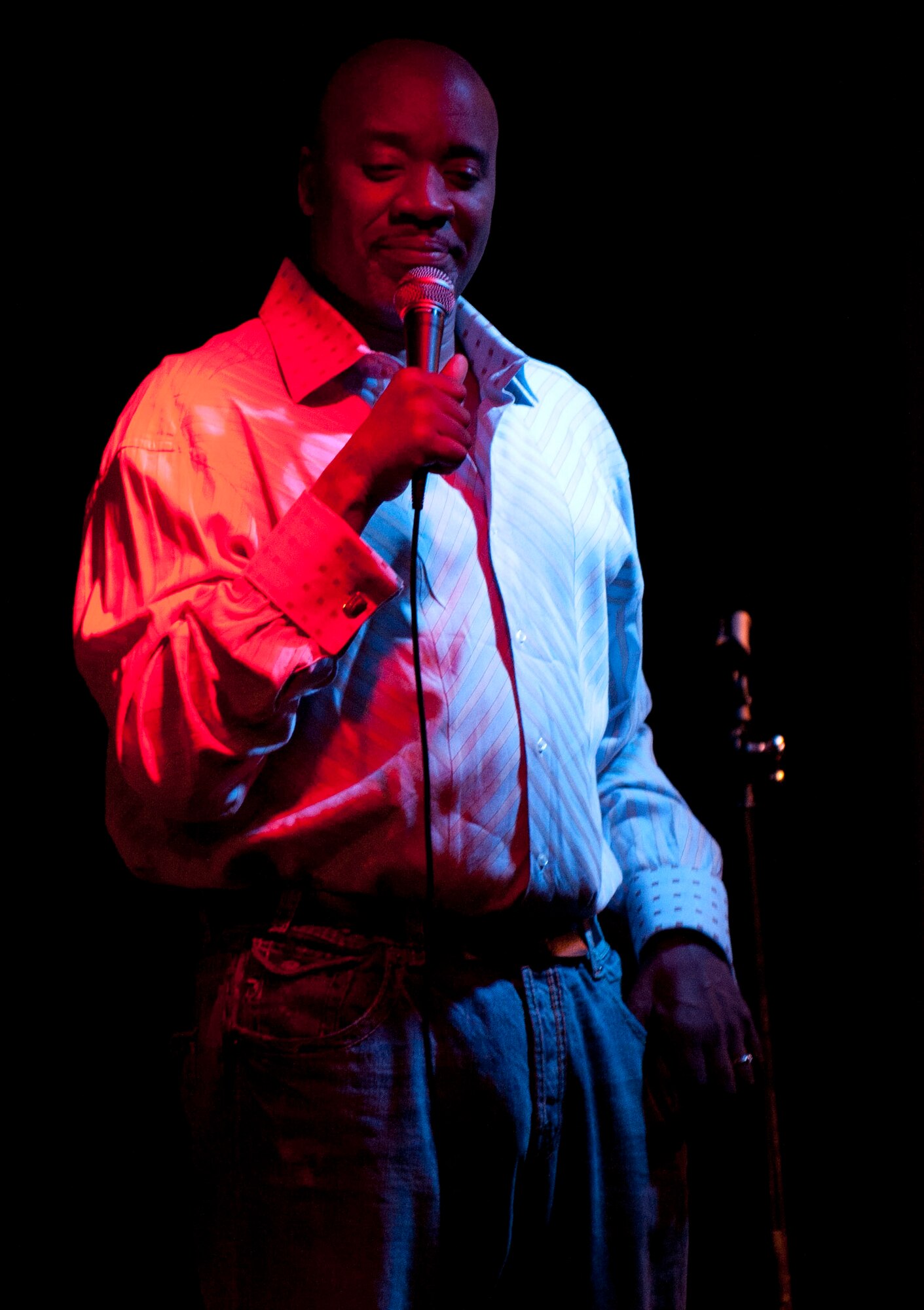 Courtney Gee, a comedian, performs during the BET All Star Comedy Show, Sept. 23, 2011, at the Club Complex, Incirlik Air Base, Turkey. The comedy show visits several venues across Europe. (U.S. Air Force photo by Senior Airman Clayton Lenhardt/Released)