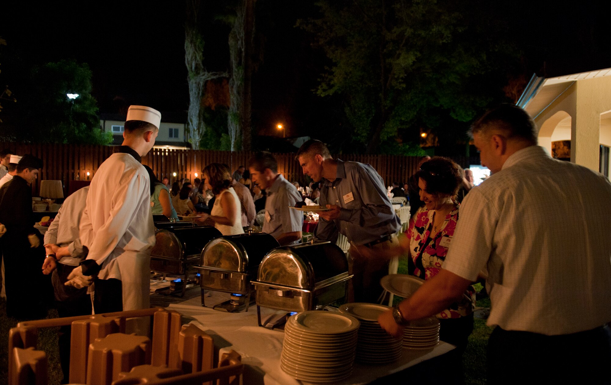 Incirlik’s 39th Air Base Wing and 10th Tanker Base Command leadership get in line for food during the annual Turkish and American social Sept. 24, 2011, at Incirlik Air Base, Turkey. The social was an opportunity for new Turkish and American leadership to interact and get to know one another. (U.S. Air Force photo by Senior Airman Anthony Sanchelli/Released) 