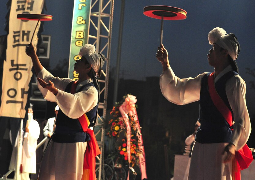 Dancers perform a traditional Korean dance Sept. 24, 2011, at the eighth annual Korean American Friendship Cultural Festival. The festival was sponsored by the Songtan Chamber of Commerce and celebrates the great friendship between Koreans and Americans. (U.S. Air Force photo/Tech. Sgt. Chad Thompson)