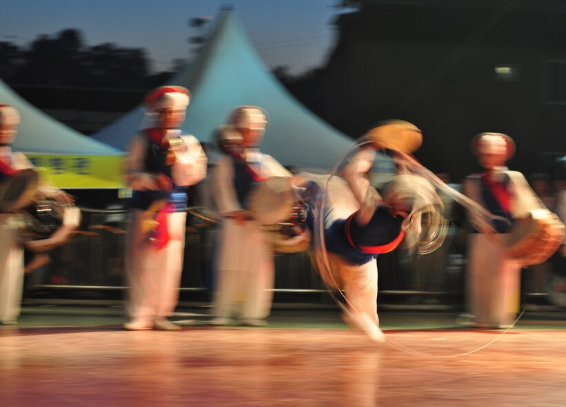 Dancers perform a traditional Korean dance Sept. 24, 2011, at the eighth annual Korean American Friendship Cultural Festival. The festival was sponsored by the Songtan Chamber of Commerce and celebrates the great friendship between Koreans and Americans. (U.S. Air Force photo/Tech. Sgt. Chad Thompson)