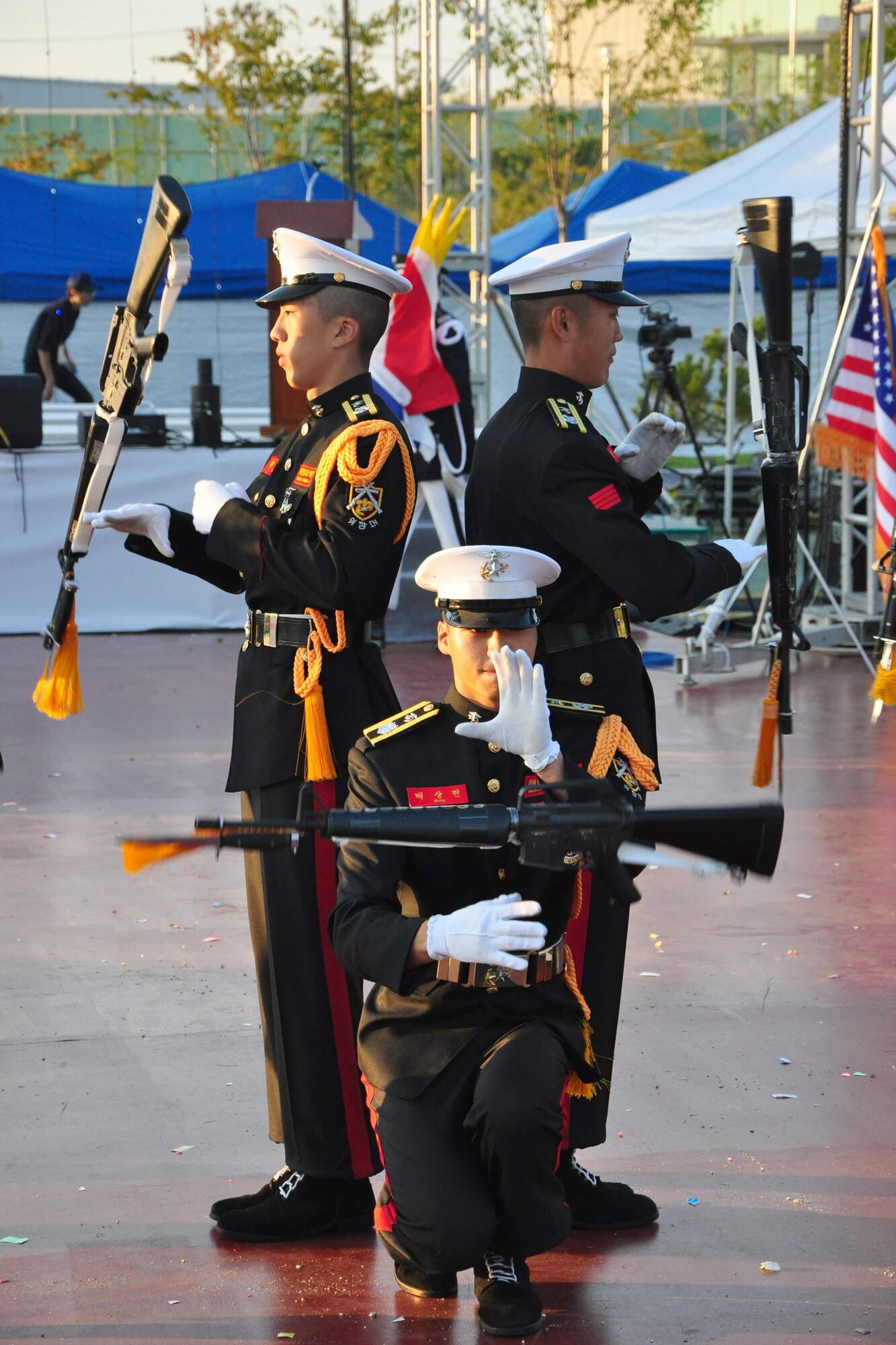 A Korean military honor guard performs a rifle drill demonstration Sept. 24, 2011, during the eighth annual Korean American Friendship Cultural Festival. The festival was sponsored by the Songtan Chamber of Commerce and celebrates the great friendship between Koreans and Americans. (U.S. Air Force photo/Tech. Sgt. Chad Thompson)