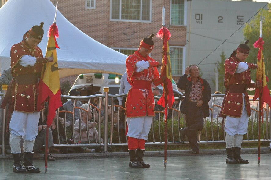 Koreans dressed in traditional military clothing bow after a martial arts performance Sept. 24, 2011, during the eighth annual Korean American Friendship Cultural Festival. The festival was sponsored by the Songtan Chamber of Commerce and celebrates the great friendship between Koreans and Americans. (U.S. Air Force photo/Tech. Sgt. Chad Thompson)